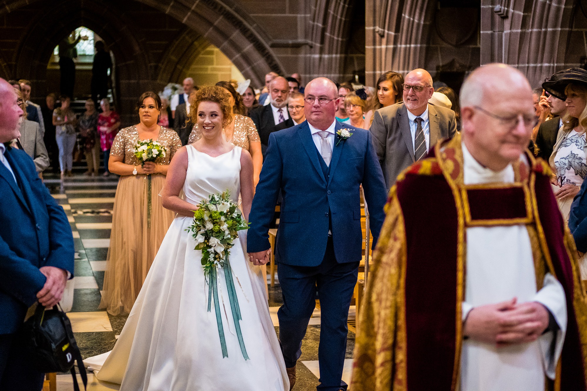bride walking down the aisle in Liverpool Cathedral