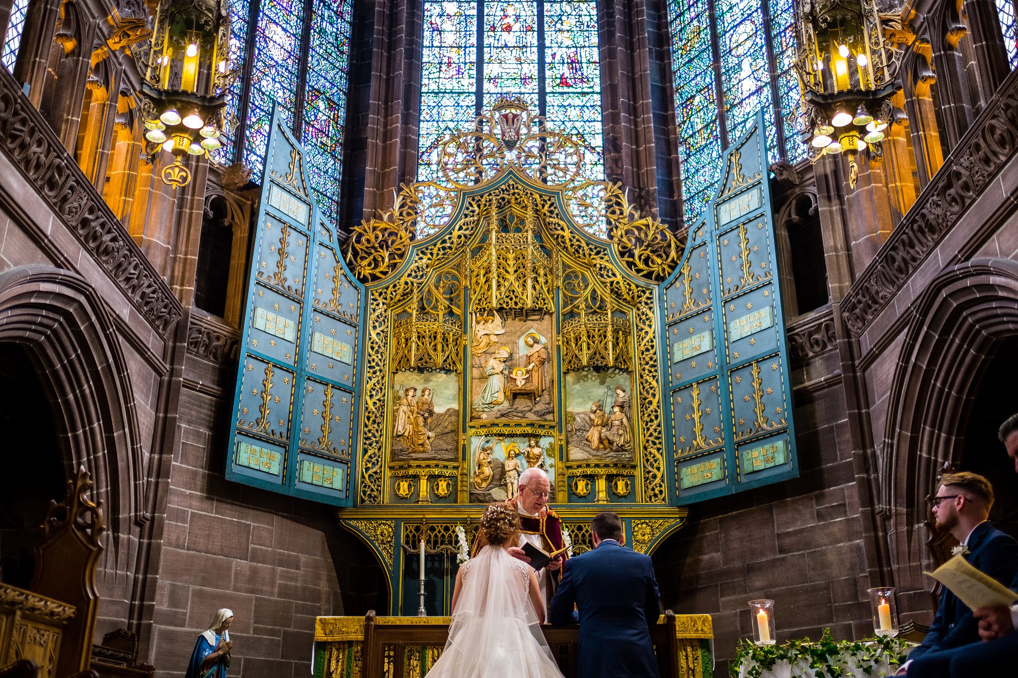 bride and groom at the alter