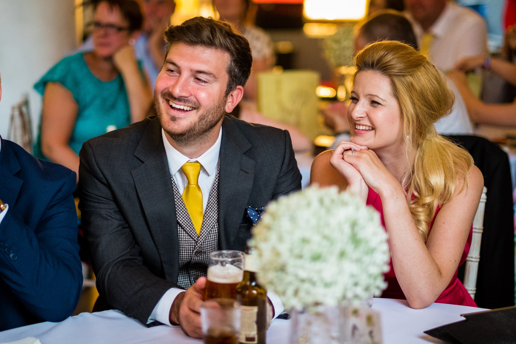 guests smiling during speeches