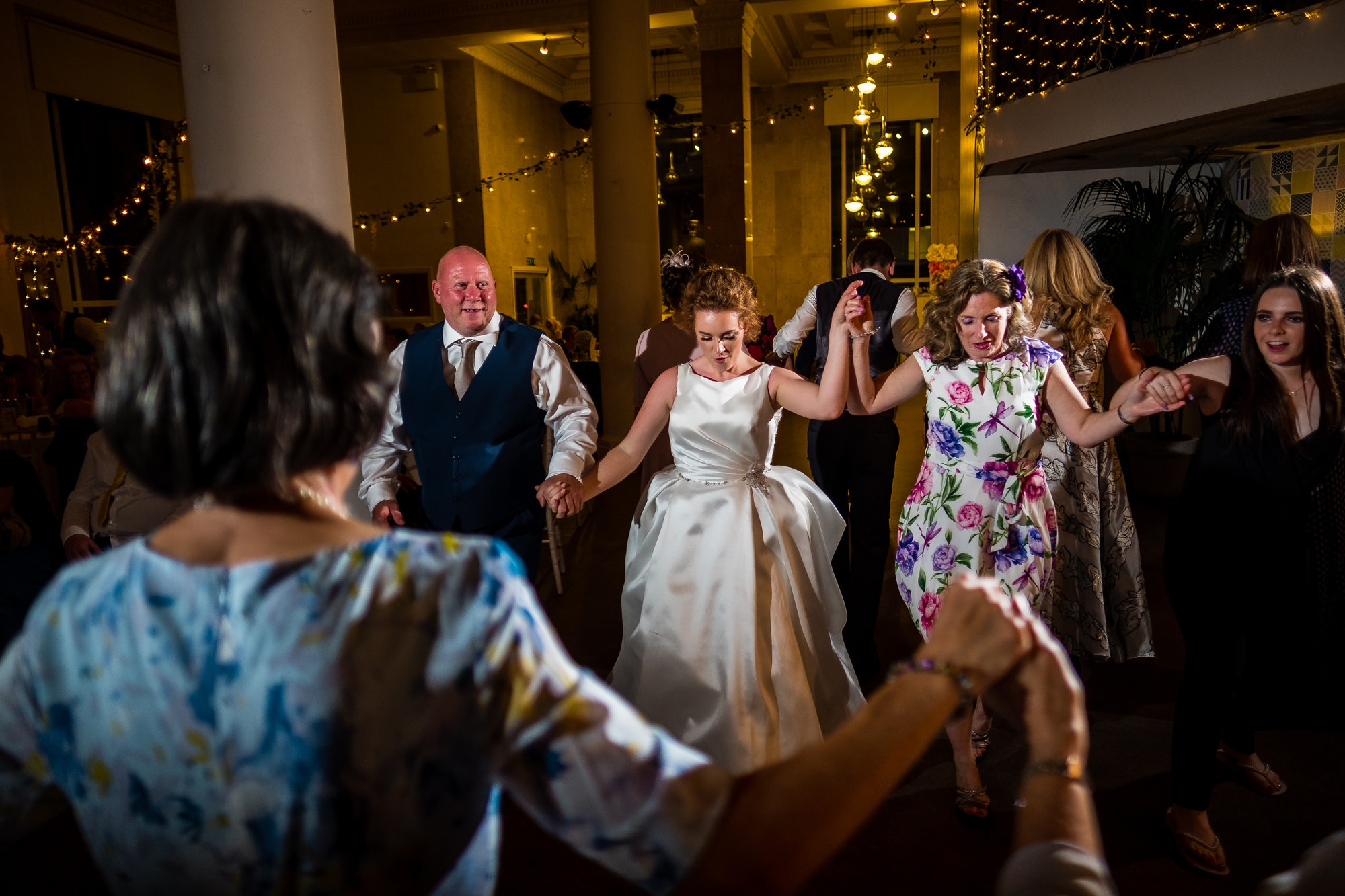 bride dancing with guests