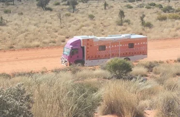 THE PURPLE TRUCK OUT ON THE ROAD