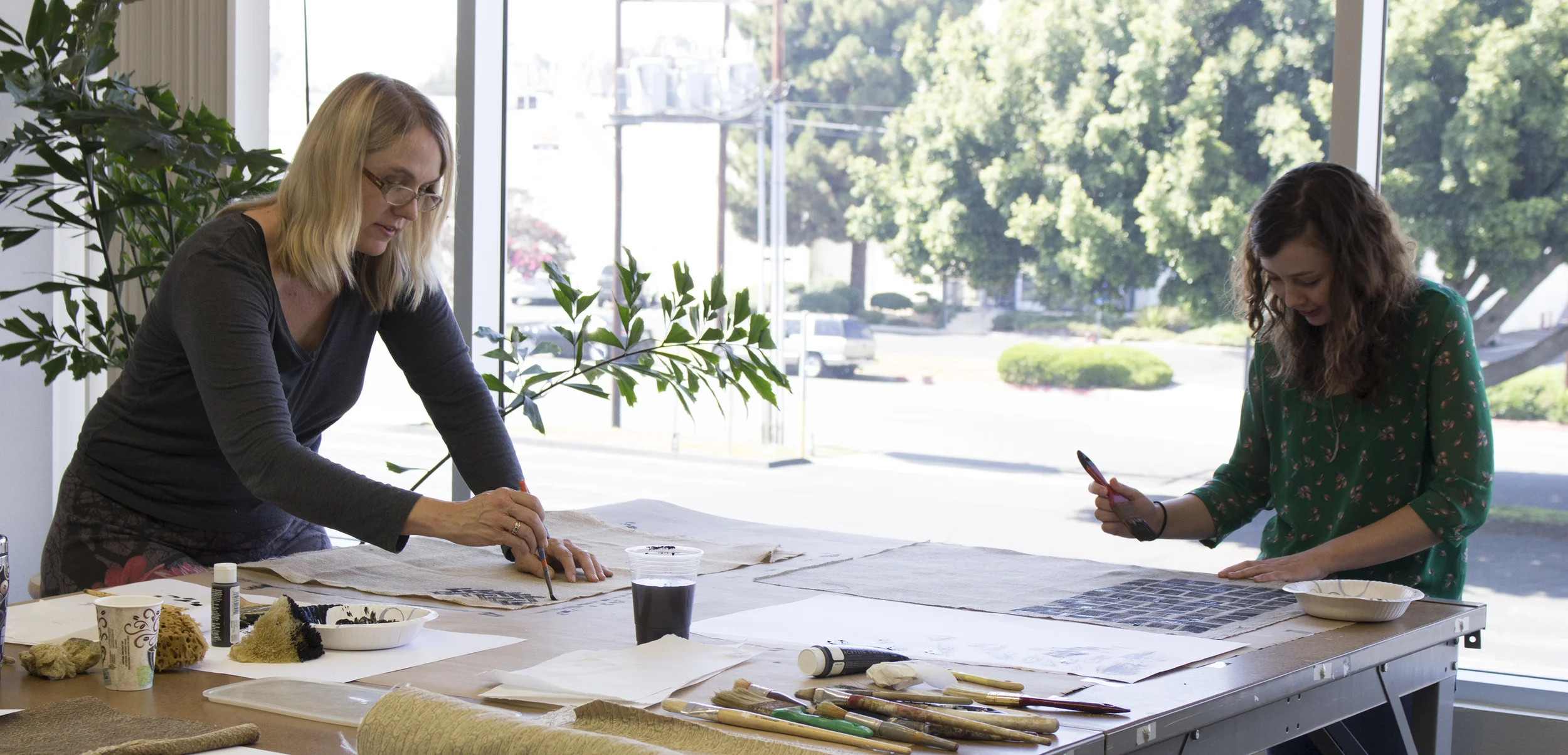 Linda Fitch and Vanessa Laurie Stevens at work in the RJR Studio