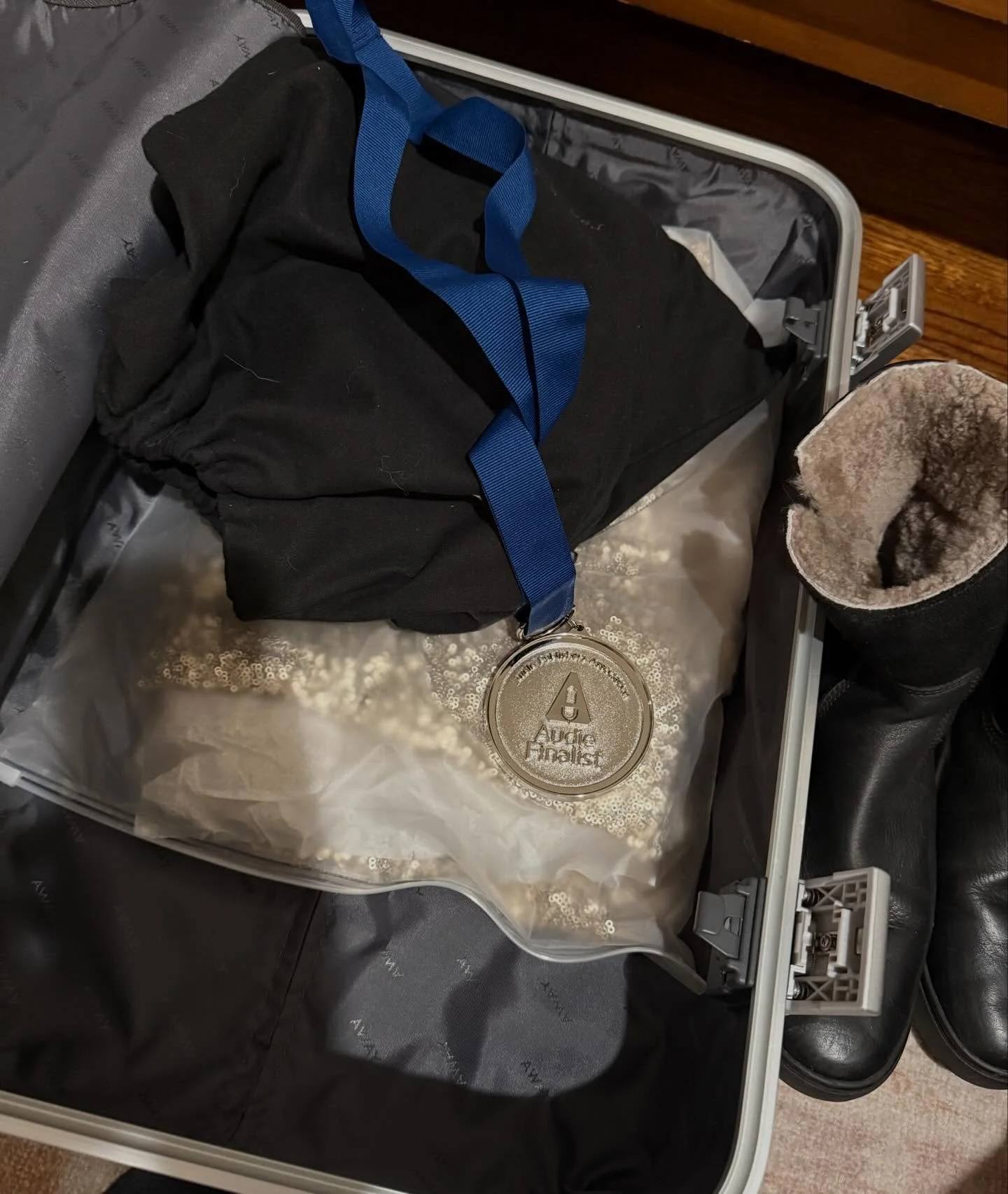 Packing the essentials for NYC. Snow boots ✔️Sequins ✔️ Audie Finalist medallion ✔️ Let&rsquo;s go @selfcarewarrior author Shahida Arabi, MA! Thank you so much @audiobooks @tantoraudio #audies2026