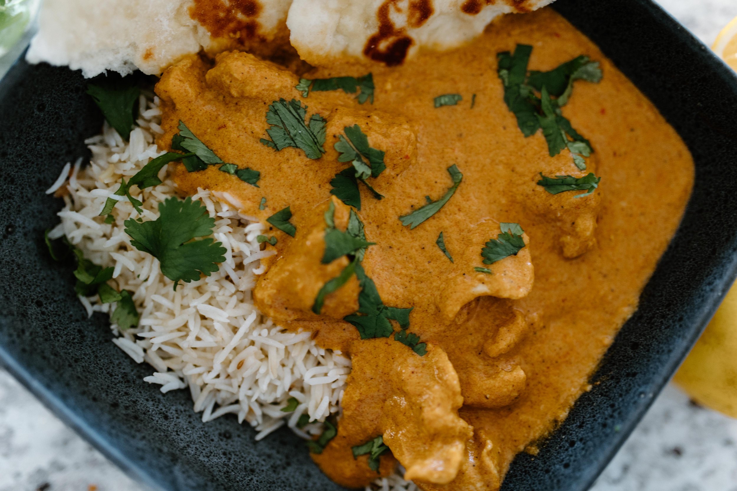 Slow cooker butter chicken served with rice