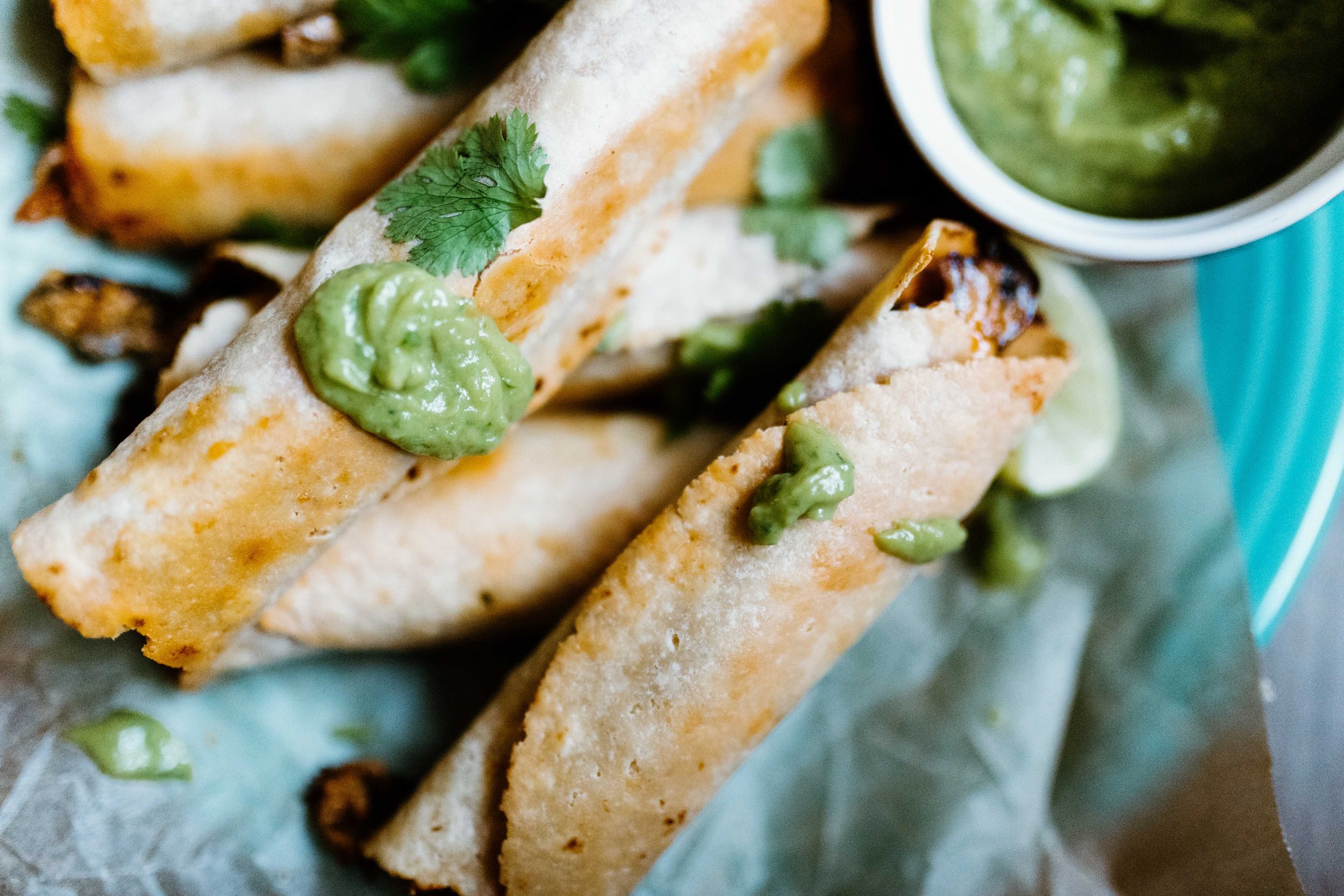 Avocado crema goes perfectly well with ground turkey taquitos