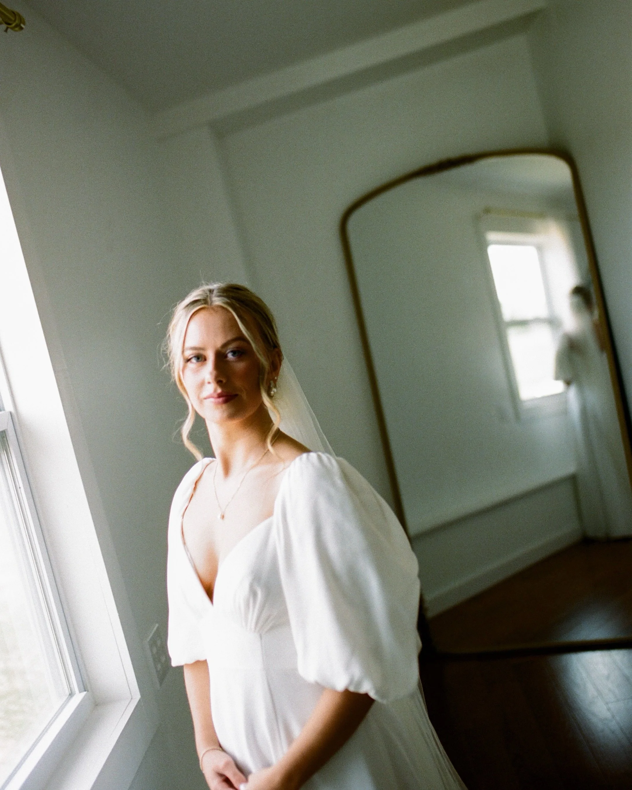 Emma + Rylan (on film) are perhaps most synonymous with joy, laughter, and sacred moments uninterrupted by trends or production. Their day was full of genuine moments, walkie talkie conversations during getting ready, private vows, first touches and 