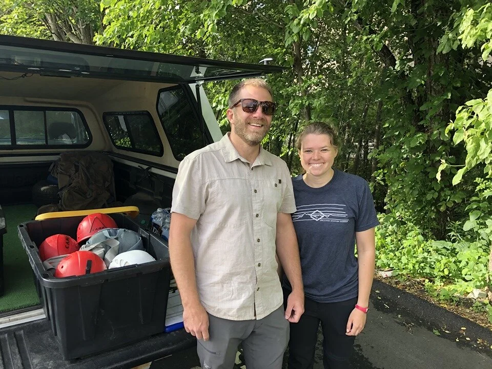 Jesse and Brittany gear up for a climbing program.