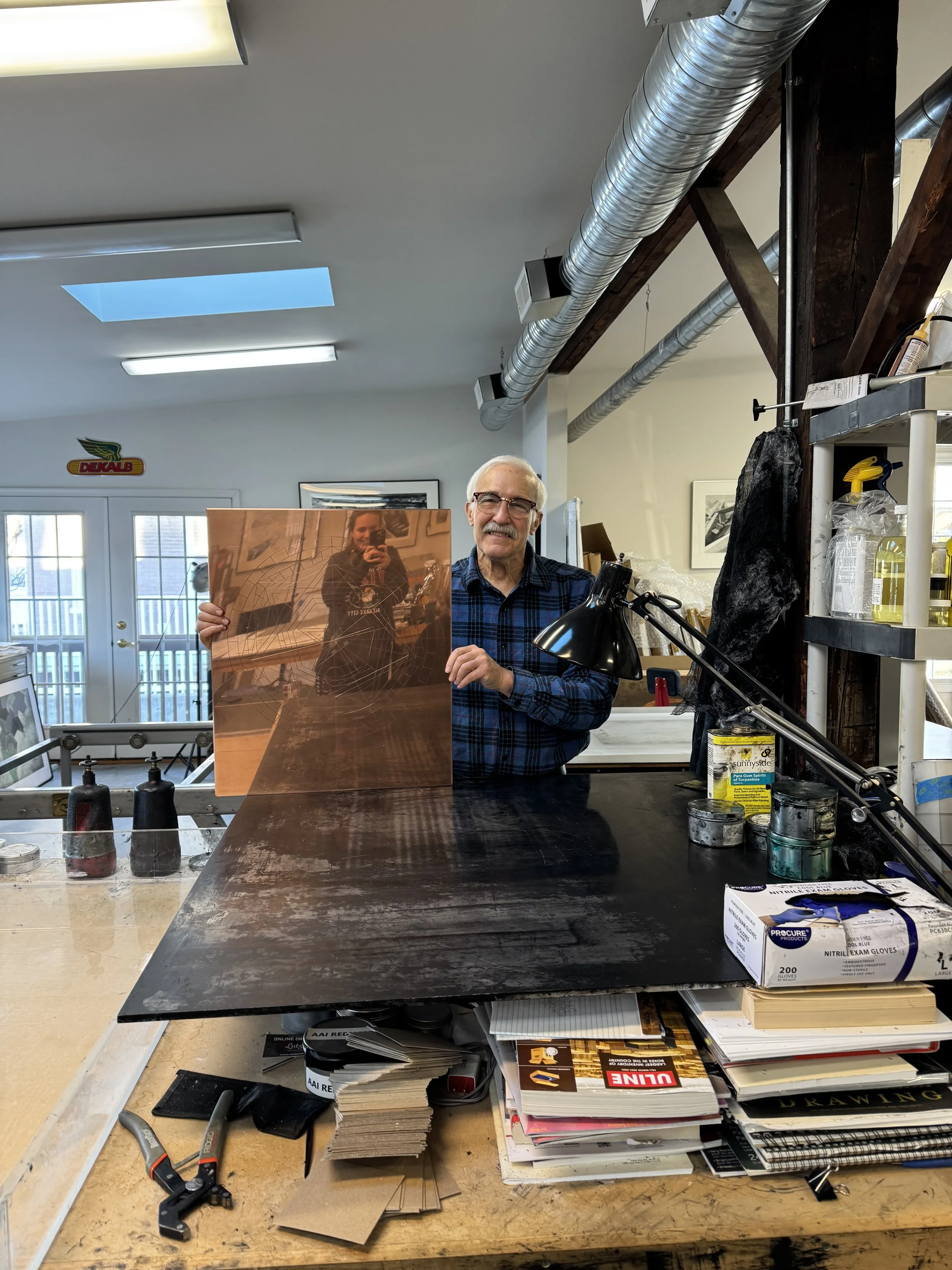 Evan in Studio 108 with the plate (Abbee in the reflection)