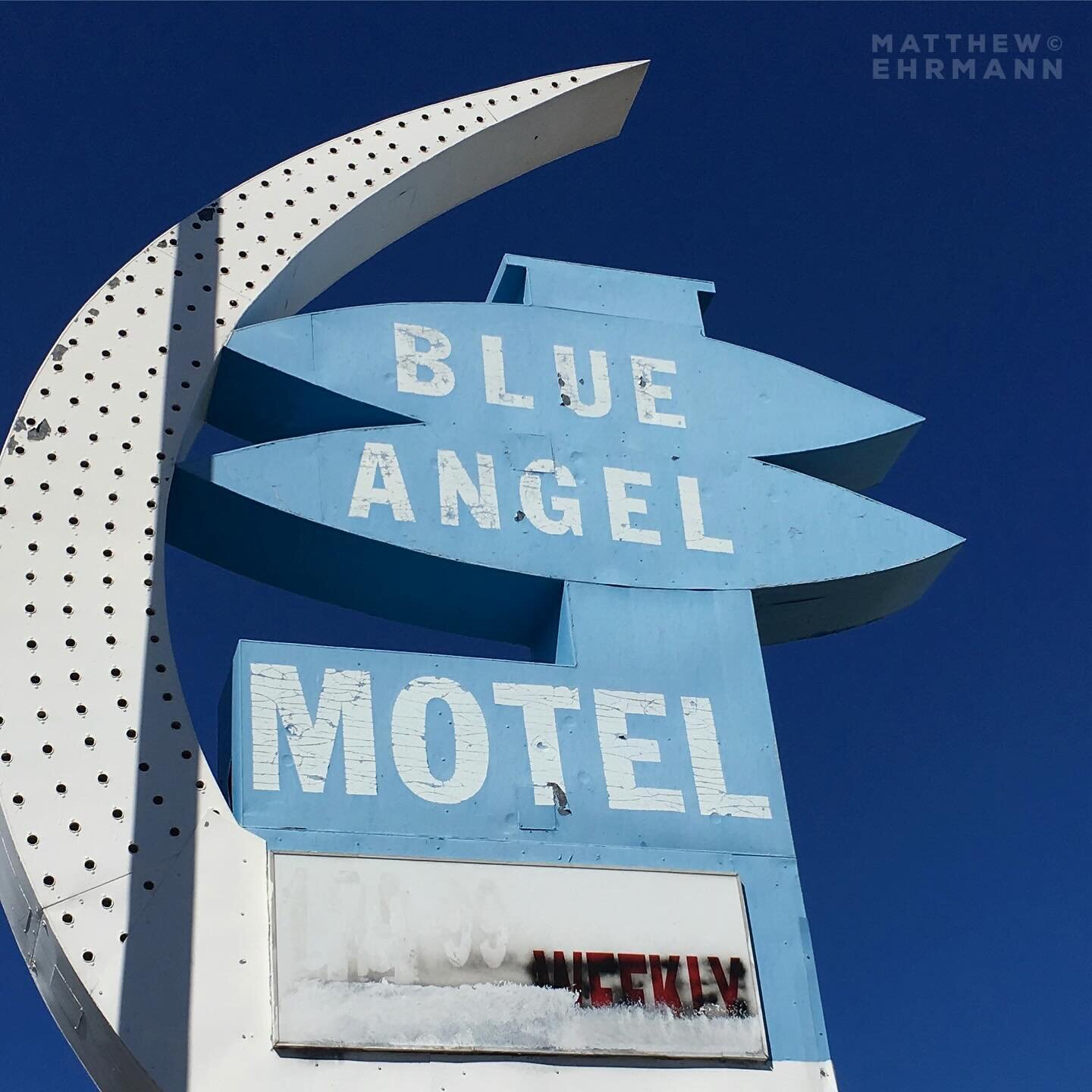 The Blue Angel Motel (est. 1957) shut down sometime around 2015, after becoming yet another run-down weekly rental place on East Fremont St. This photo was taken after the building was bulldozed, but before the signage was removed. The Blue Angel sig