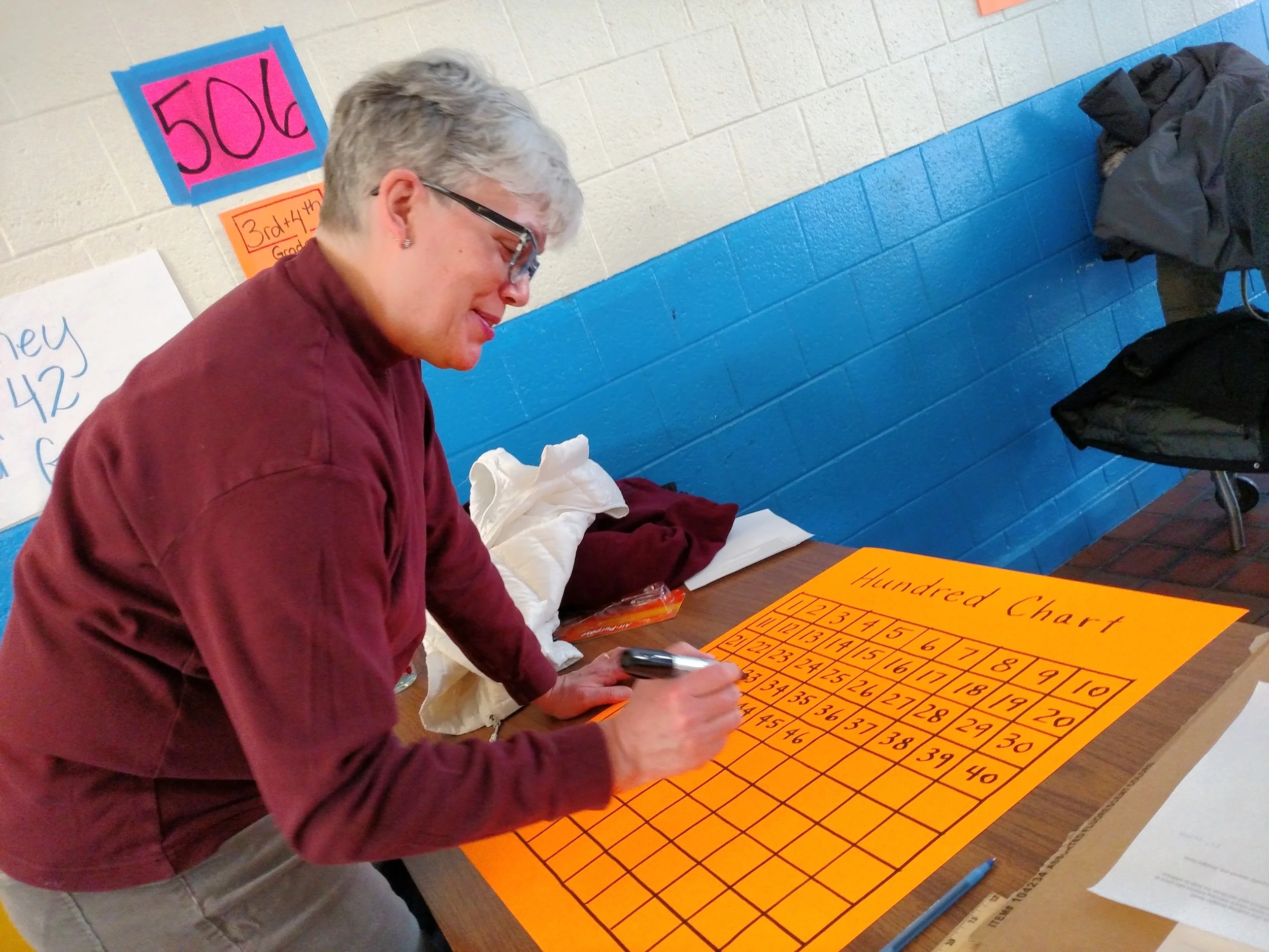 A Volunteer Creates a Hundreds Chart to Support Students at the Blackstone School