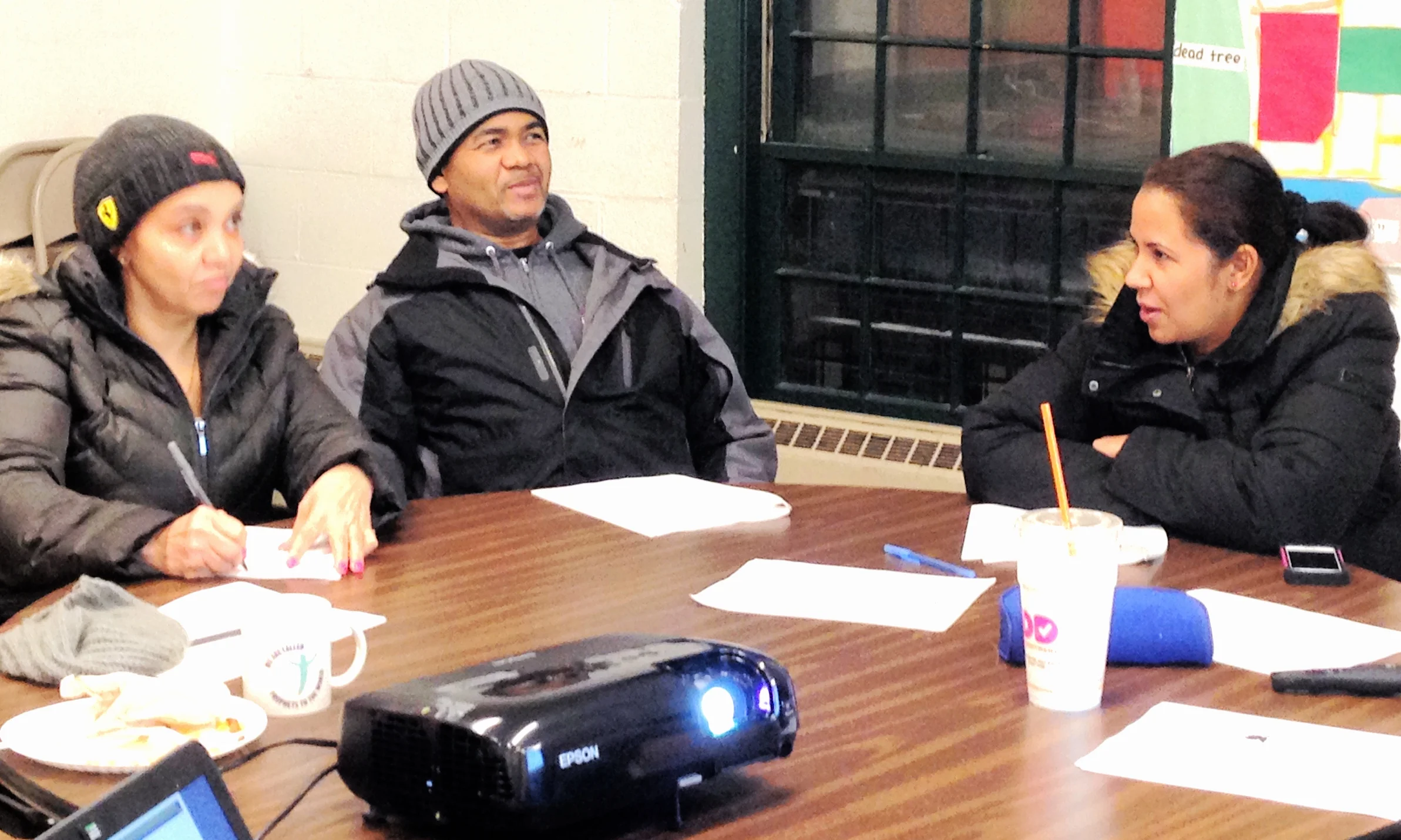 Parents share stories with one another at the second Parenting Workshop.