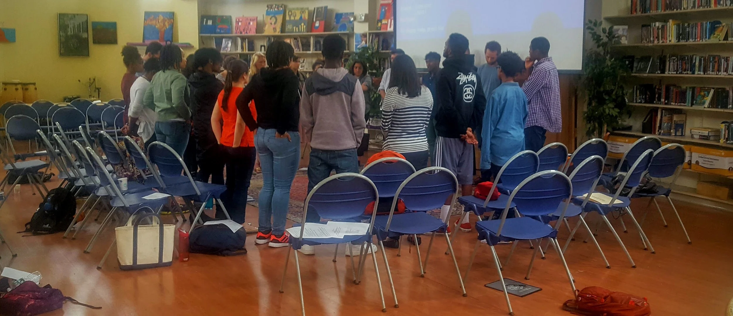Teaching specialists during a mindfulness activity reflecting on recent events during workshop.