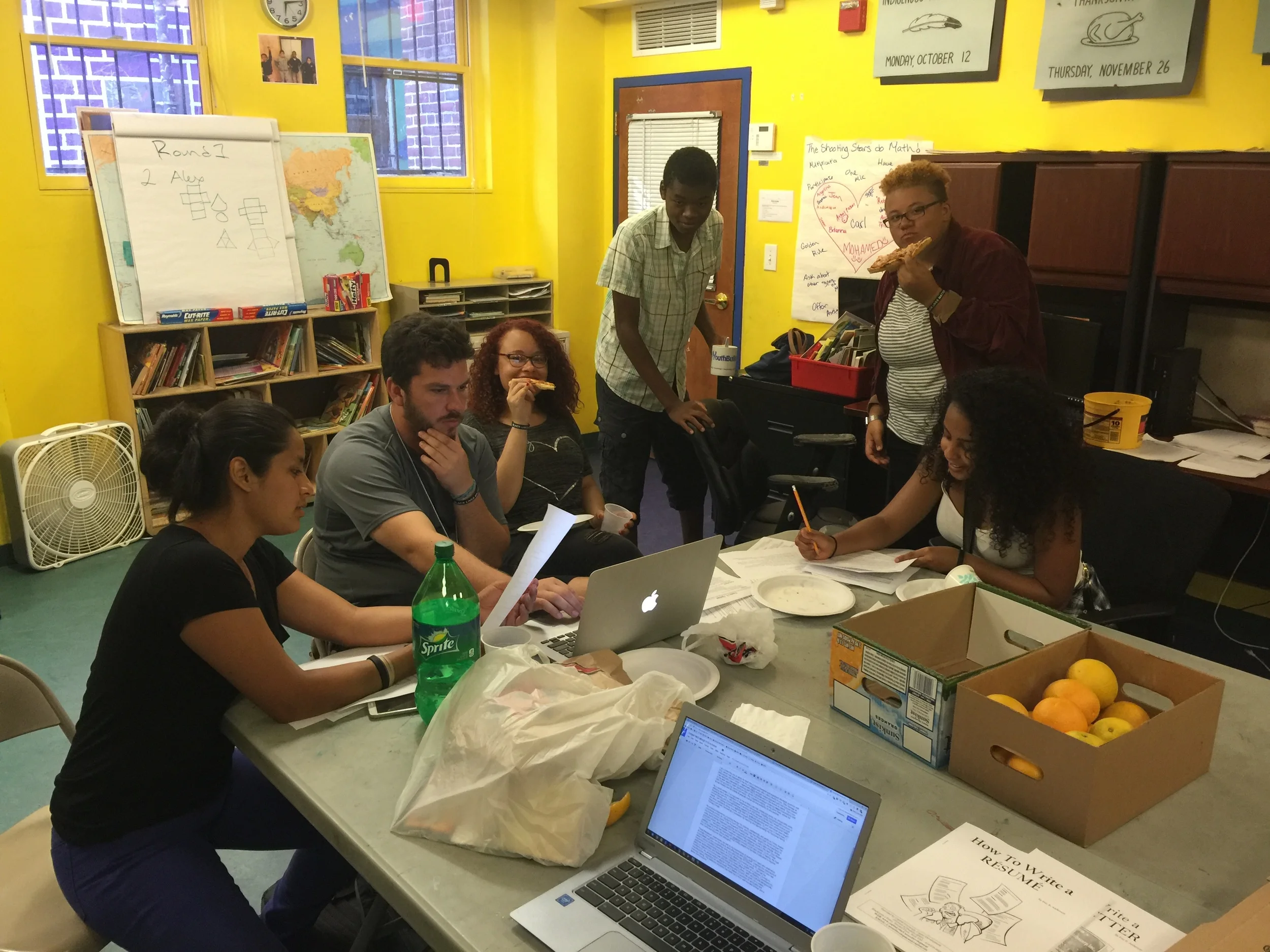Teens, Specialists, Site Assistants and Site Directors participate in a resume workshop.