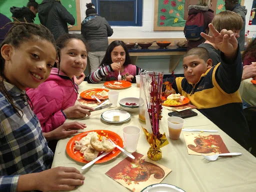 YLC dines in the downstairs Art Room at St. Stephen's
