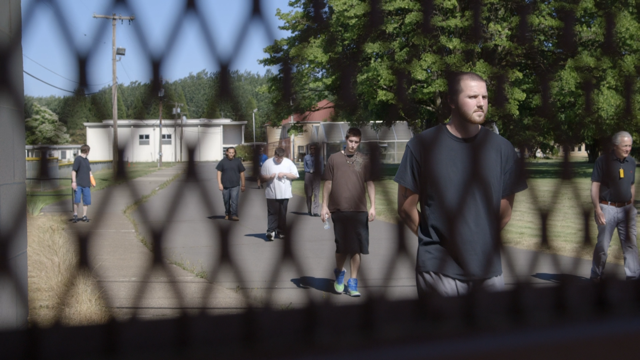 Kids behing fence.png