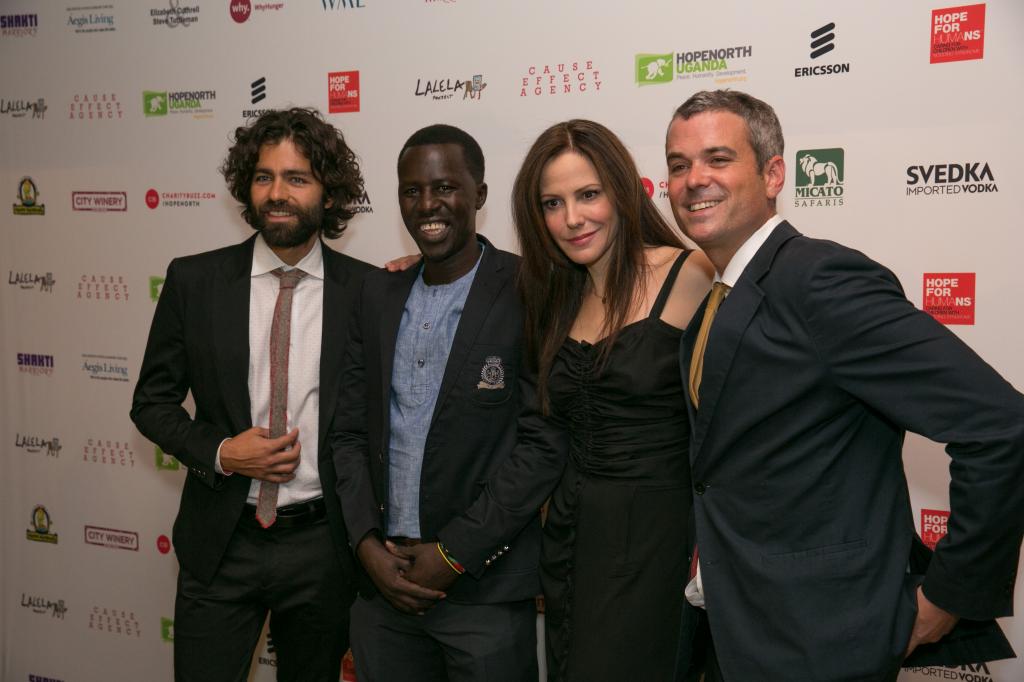 Cause Effect Agency's founder Chris Talbott with Adrian Grenier, Mary-Louise Parker, and Hope North's founder Okello Sam. © Phil Nee for Cause Effect Agency.