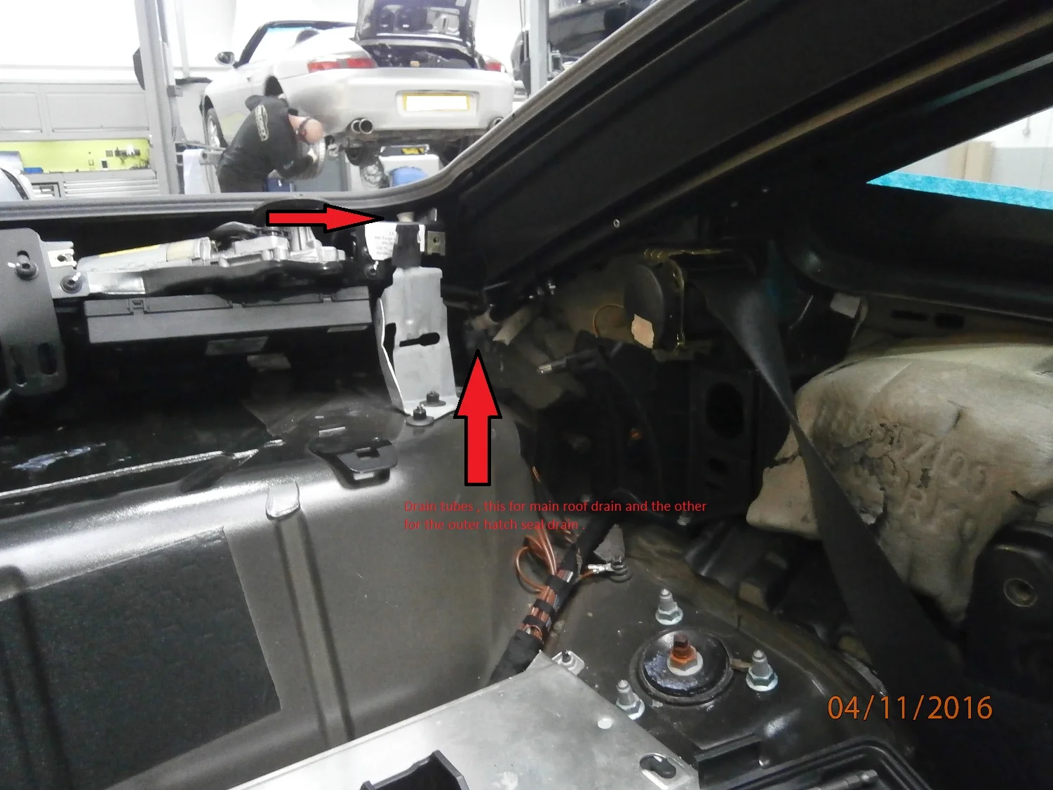 The arrows point to the drain tubes