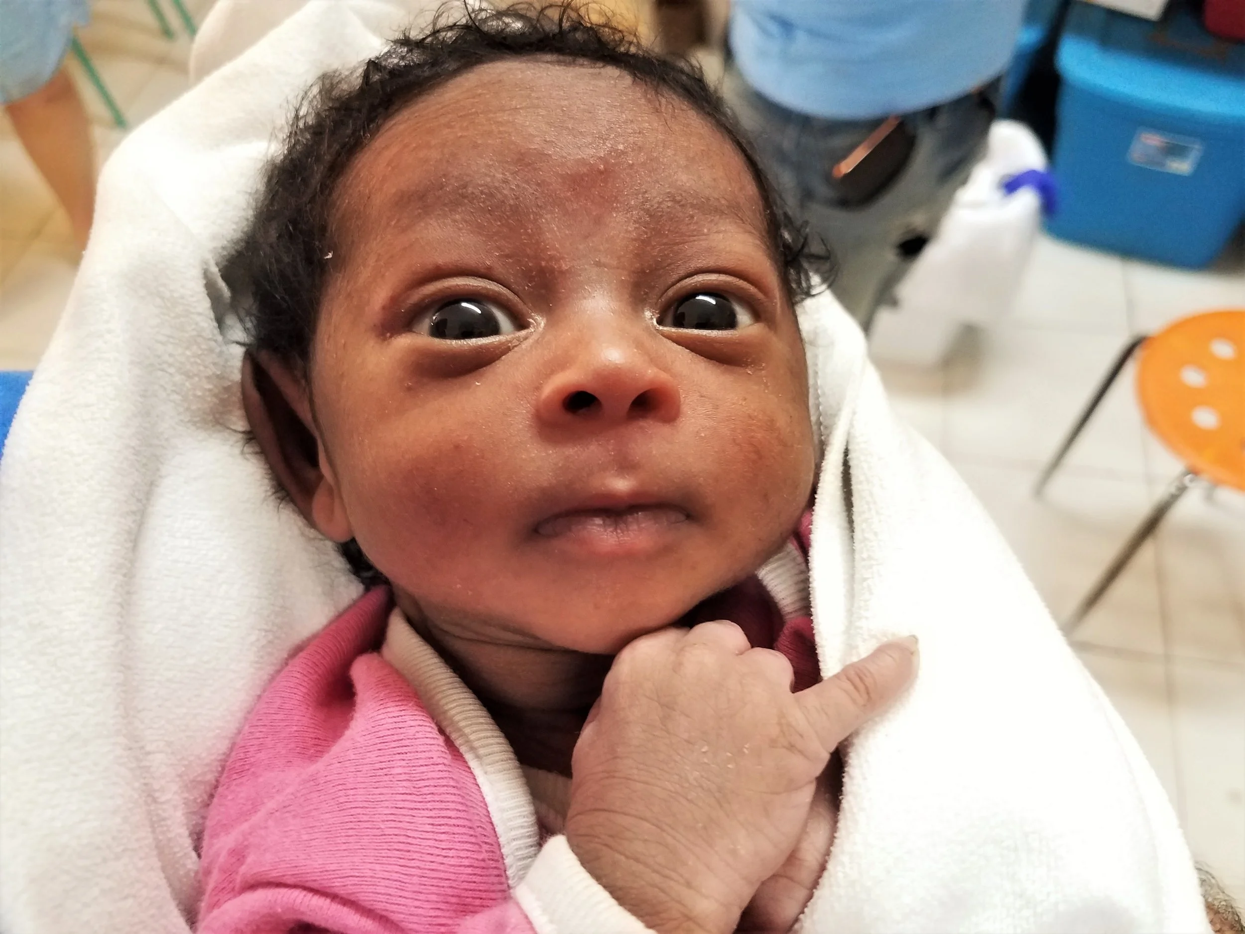 This is Emira, she is 18 days old and weighs 5.2 pounds