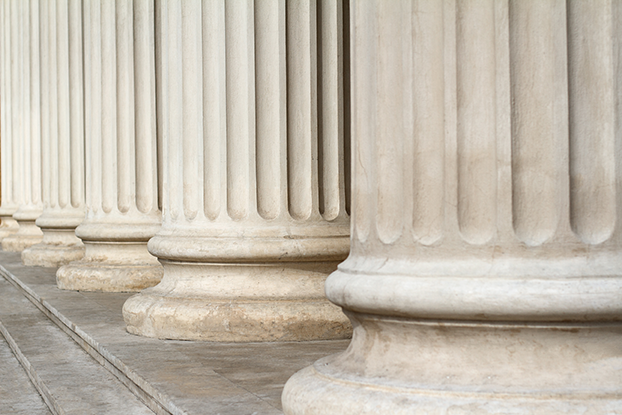 classical-columns-close-up-architecture-point-compliance-group-government-contracting.png