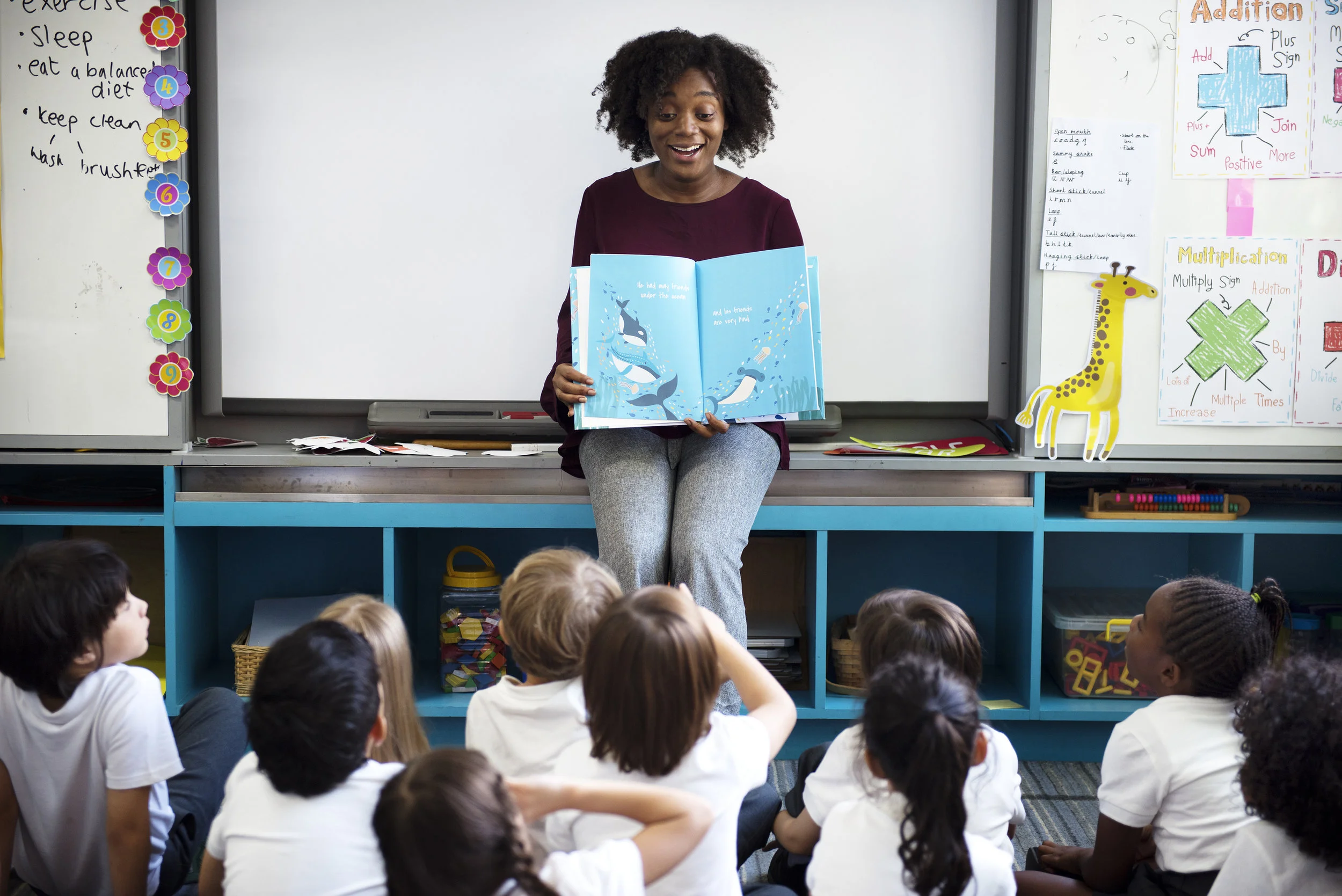 bigstock-Kindergarten-students-sitting--206153146.jpg