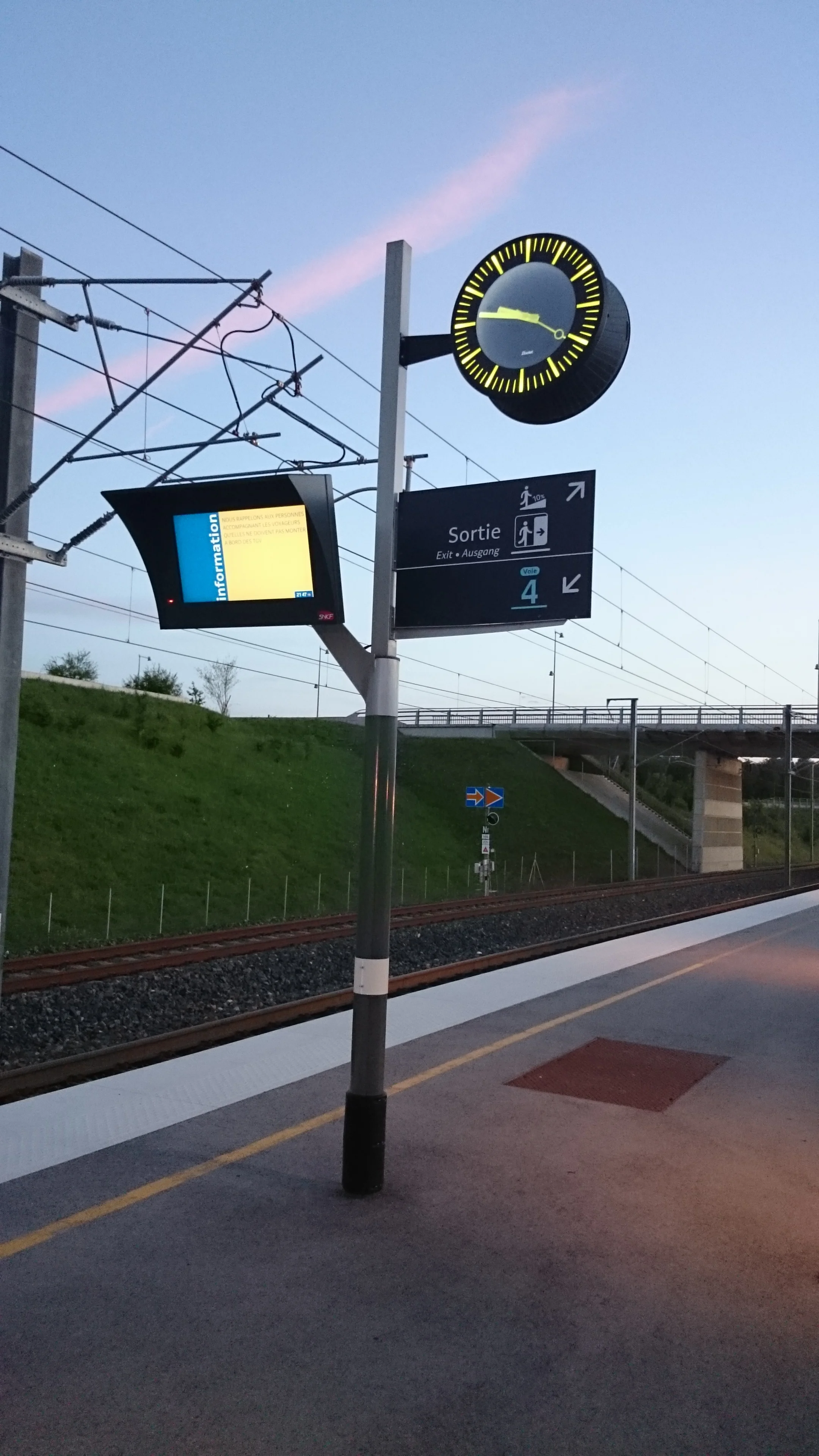 Almost 10 PM waiting at the train station 