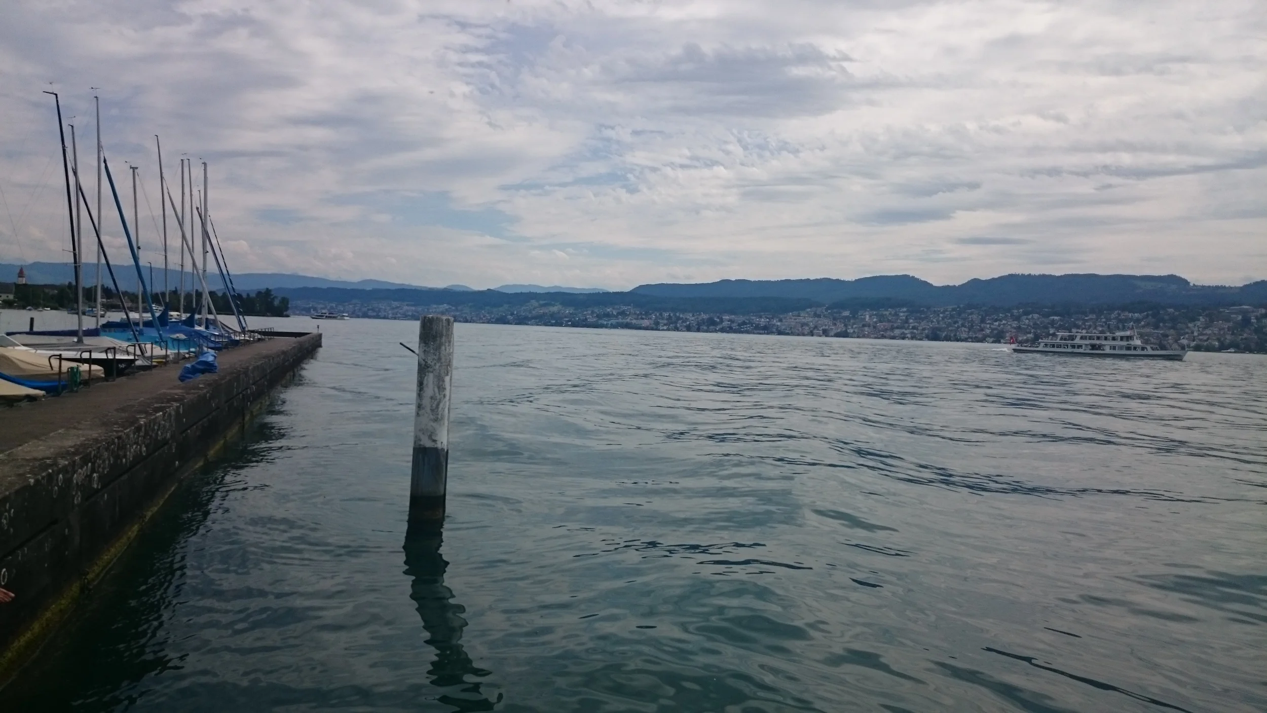 Gloomy photo- View of zurich and the alps blocked by the clouds