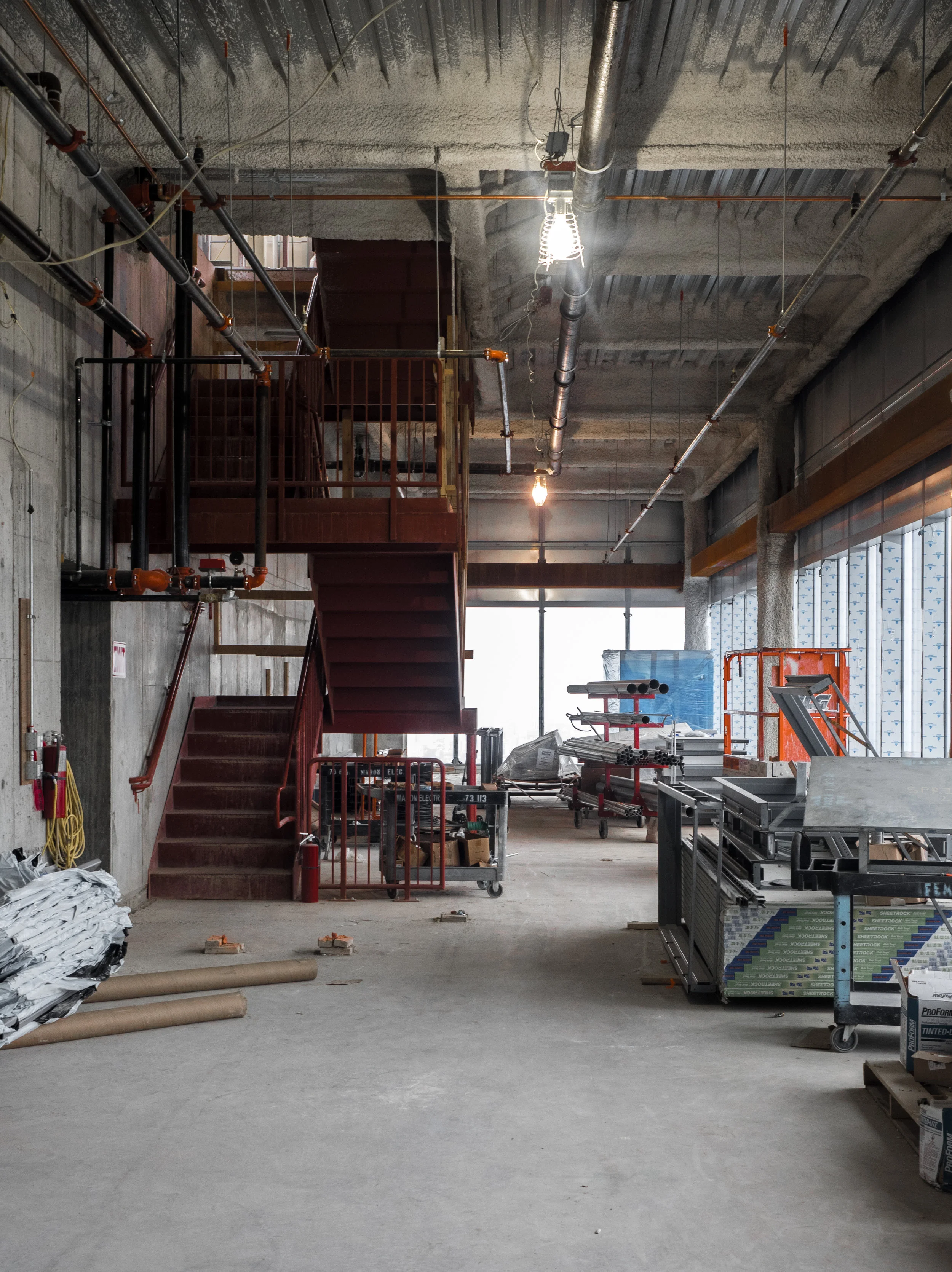 Raw interiors with basic piping and finishings