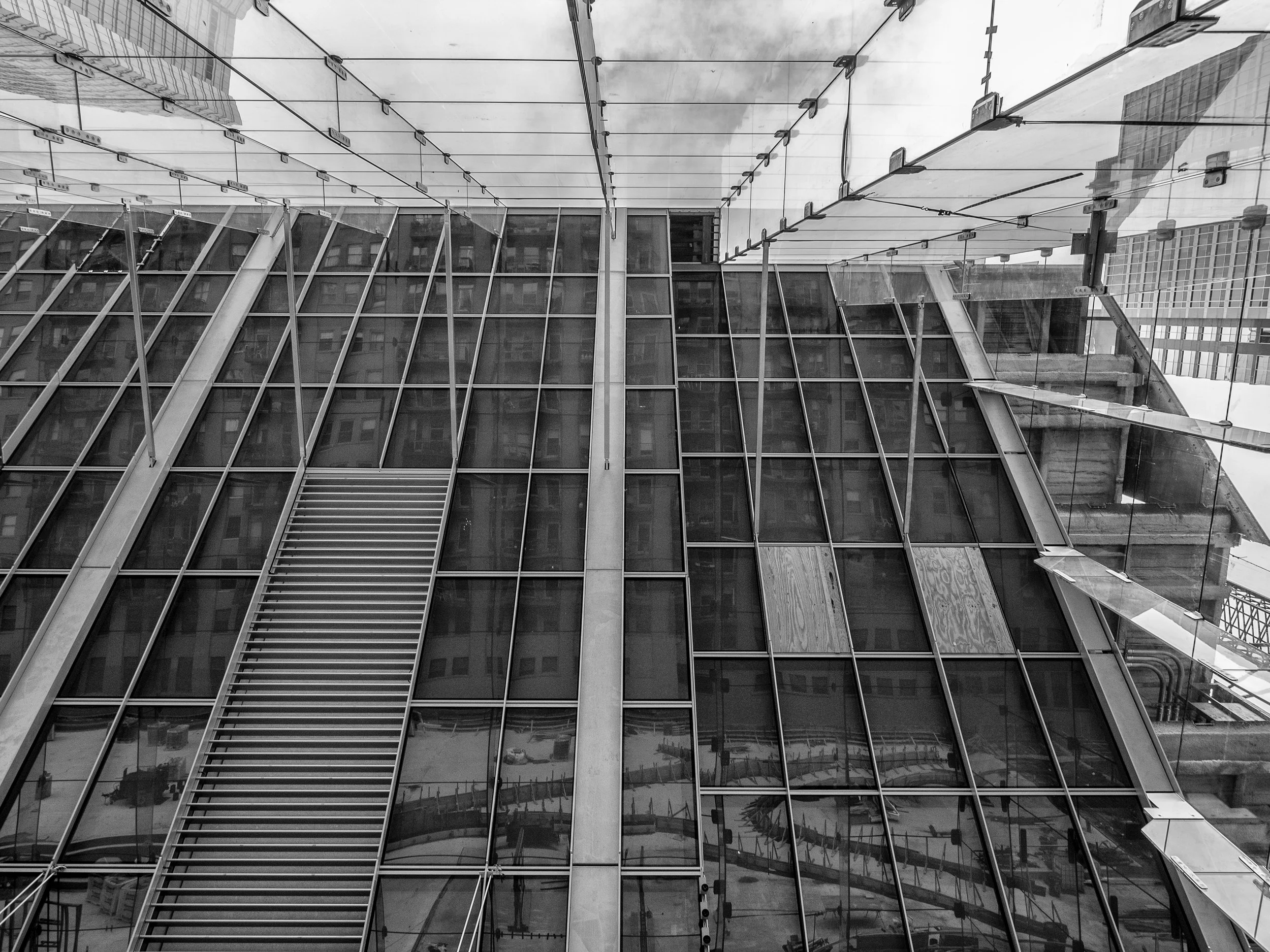 Reflection looking up from the lobby space- can see the landscape reflected from the angled surface