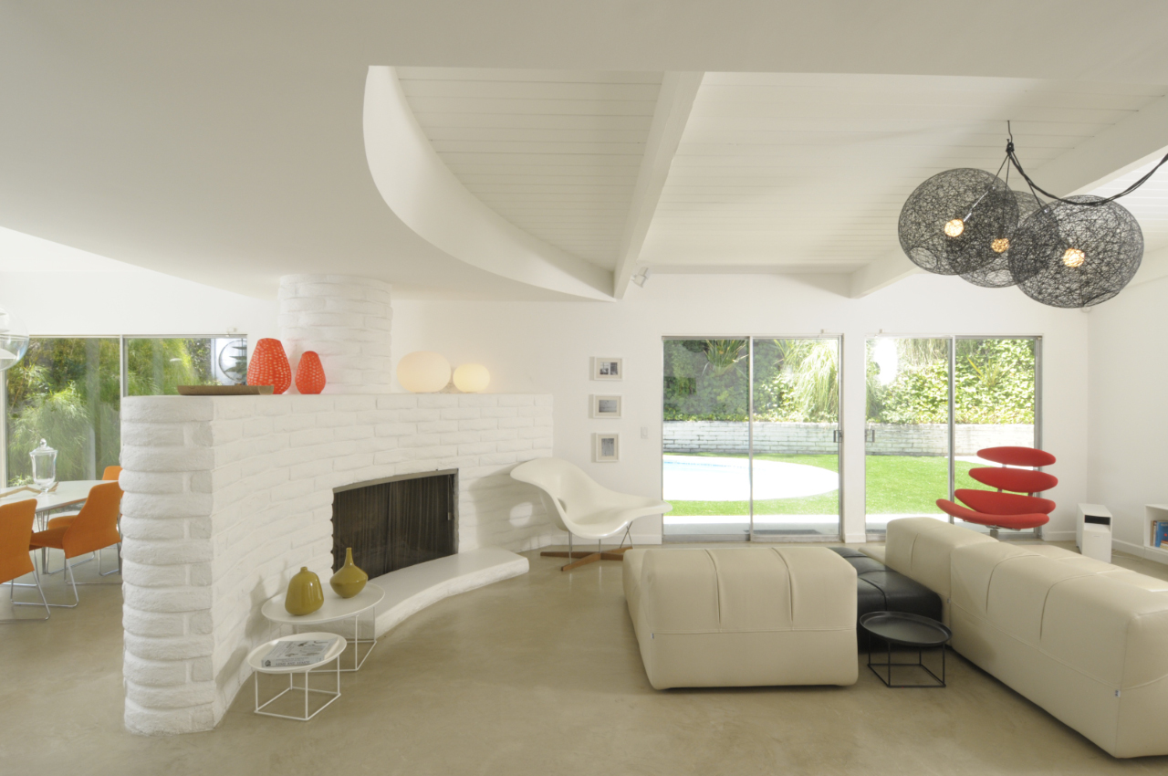 This sleek, published Mid-Century Modern dwelling has been stylishly renovated and presents the ultimate in modern living.