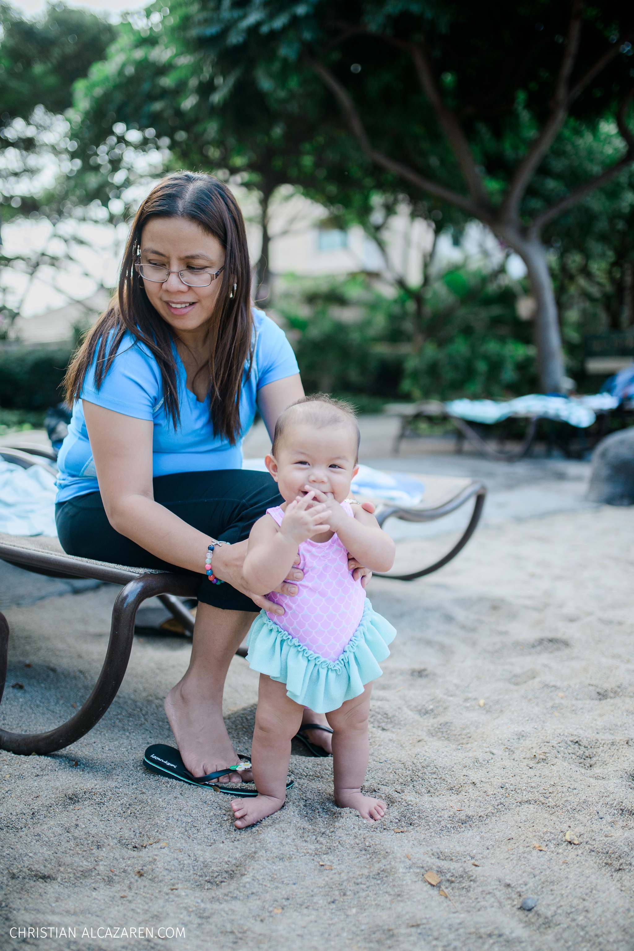 This is Nicole's first sand and water dip. She was so giggly and curious.
