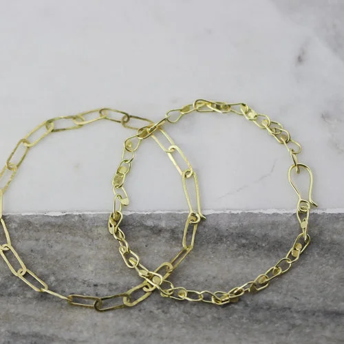 Sophie Hughes 18K Thin Link Chain Bracelet and 18K Dot Chain Bracelet.jpg