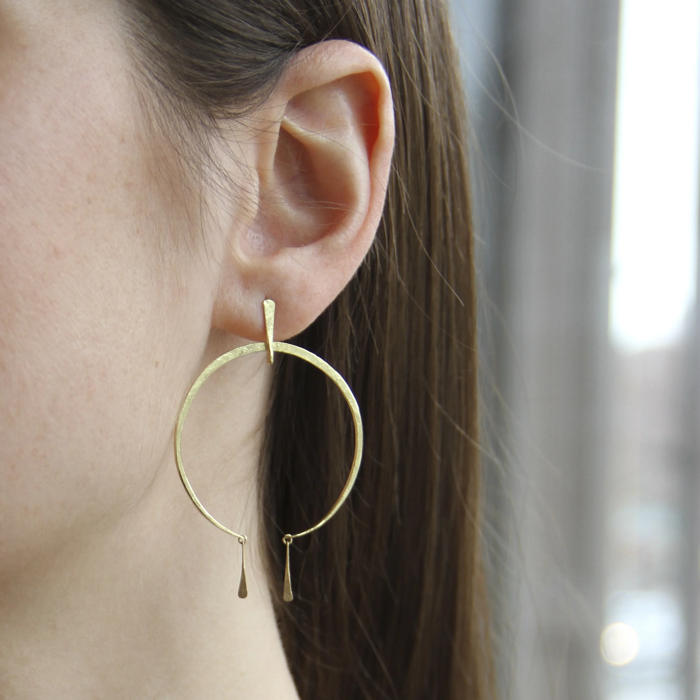 Sophie in Open Crescent Hoops with Tassel.jpg