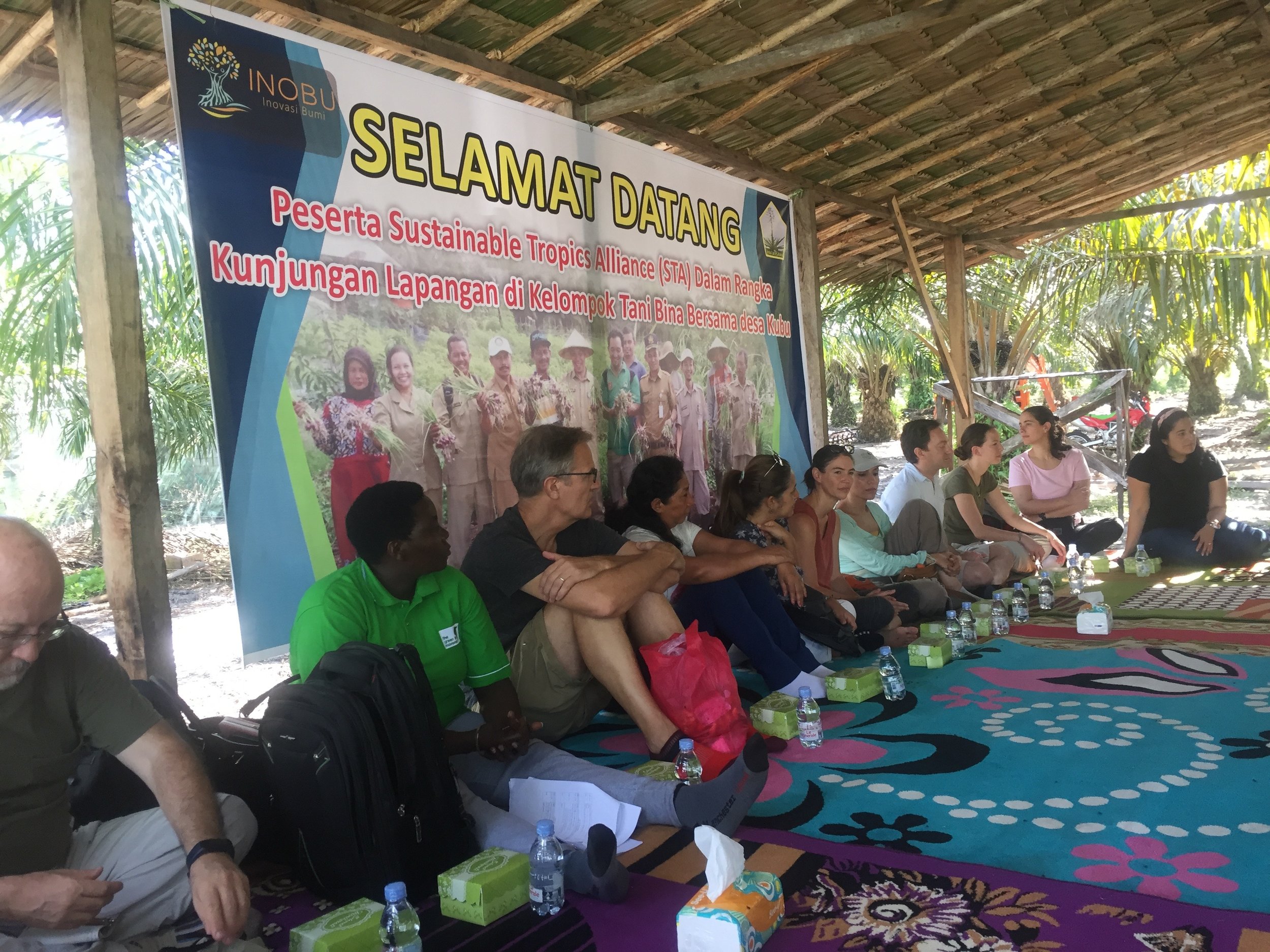 STA members are welcomed by indigenous palm oil farmers and listen to their stories of success.