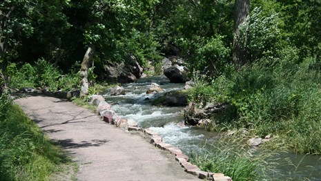Visit the historic town of Pipestone, MN and experience the sacred peaceful grounds of Pipestone National Monument. On this land dedicated to peace and integration of all people we will explore healing trauma through yoga based on the books, Overcoming Trauma through Yoga-Reclaiming Your Body by David Emerson and Elizabeth Hopper, Phd, the IRest Program for Healing PTSD by Richard C. Miller, and Donald Kalsched's book, The Inner World Of Trauma, Archetypal Defenses of the Personal Spirit. To get the most out of this experience, I would recommend purchasing the books! Our experience will begin at 4 p.m. Friday October 13 and run through dinner Saturday. Our days will include learning about the nature of trauma through fairytales, mapping our own personal and ancestral wounds and prospectively our personal and collective dharma, practicing gentle Healing Yoga and Restorative Yoga, visiting the Sacred Native American land at Pipestone National Monument. You are invited to stay overnight in a historic (rumored haunted) hotel on Friday the 13th! You will also experience healing music, a peace making ceremony, meditations, natural beauty, intriguing mystery, and a deeper level of understanding your inner world and self-care practices. Please make a downpayment to reserve your place. More information to come soon!