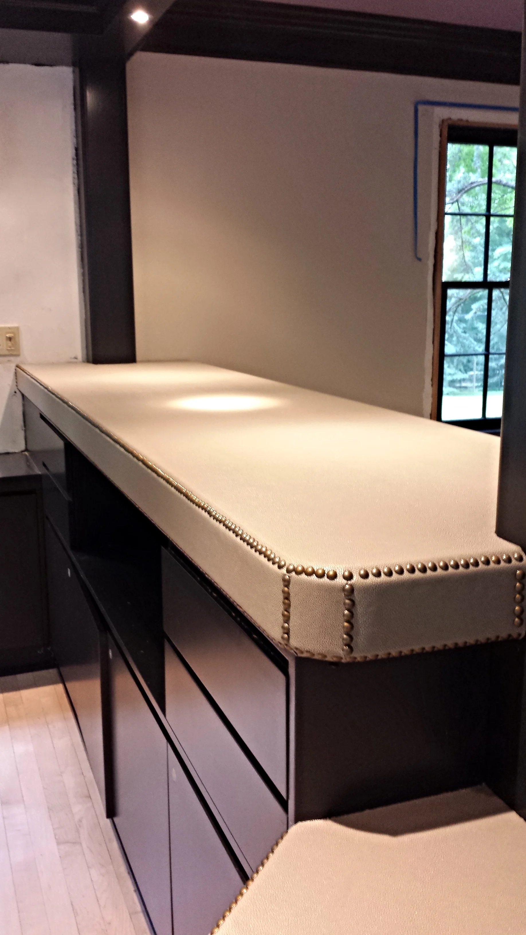 And to top it off...an upholstered leather bar top.