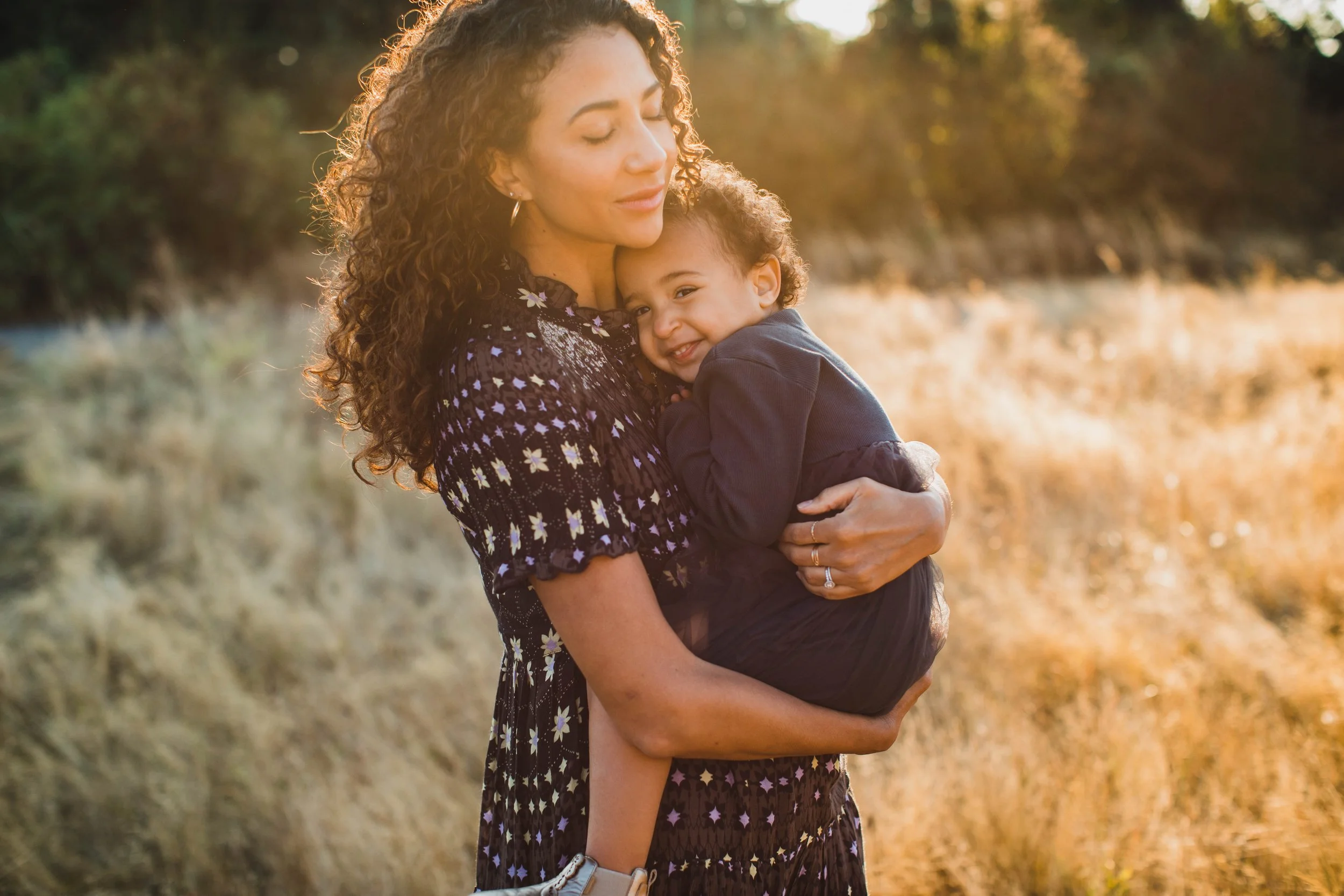 Capturing the beauty of motherhood at Discovery Park, a timeless Seattle family session.