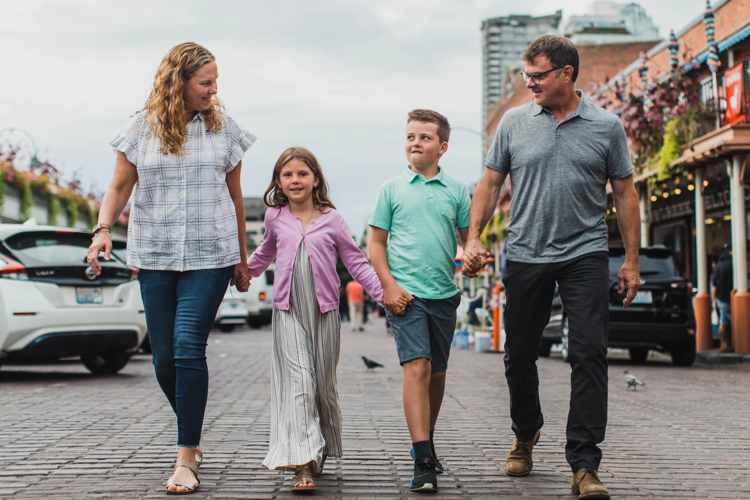 Seattle family photography, Pike Place Market cobblestones, walking family portrait, Seattle urban session, lifestyle family photographer.