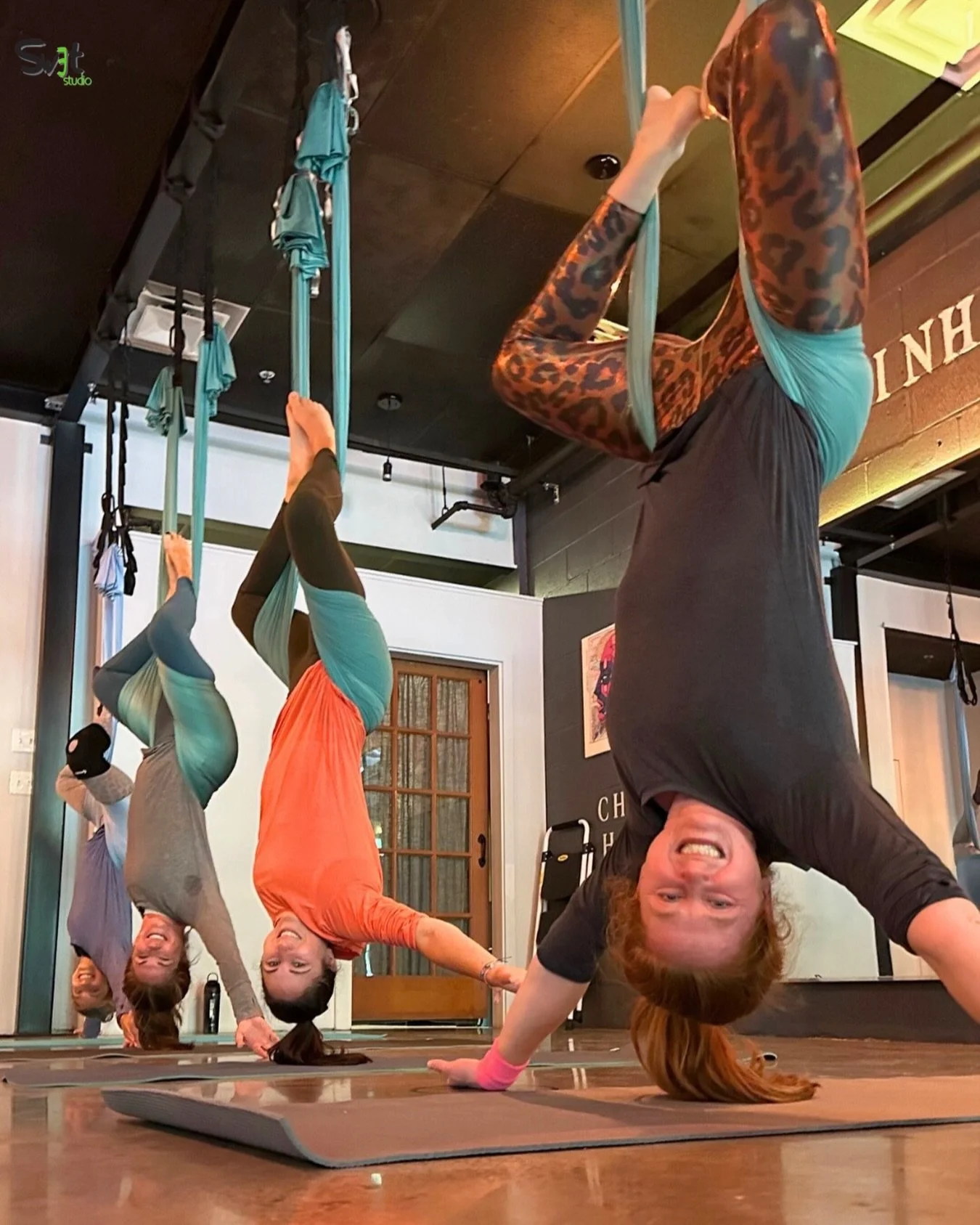 Grab your besties and hang out&hellip; literally. Aerial yoga fun with the crew! 💜 @swetstudio 

#yogaboston