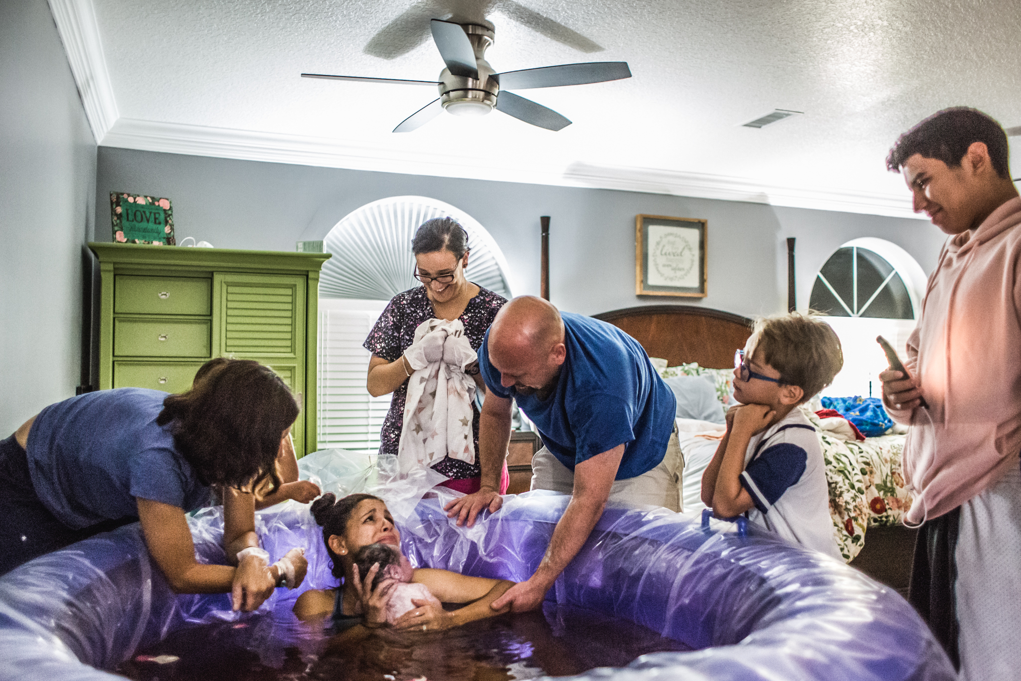 surprise gender reveal after water birth at home with a midwife and children awake  4.jpg