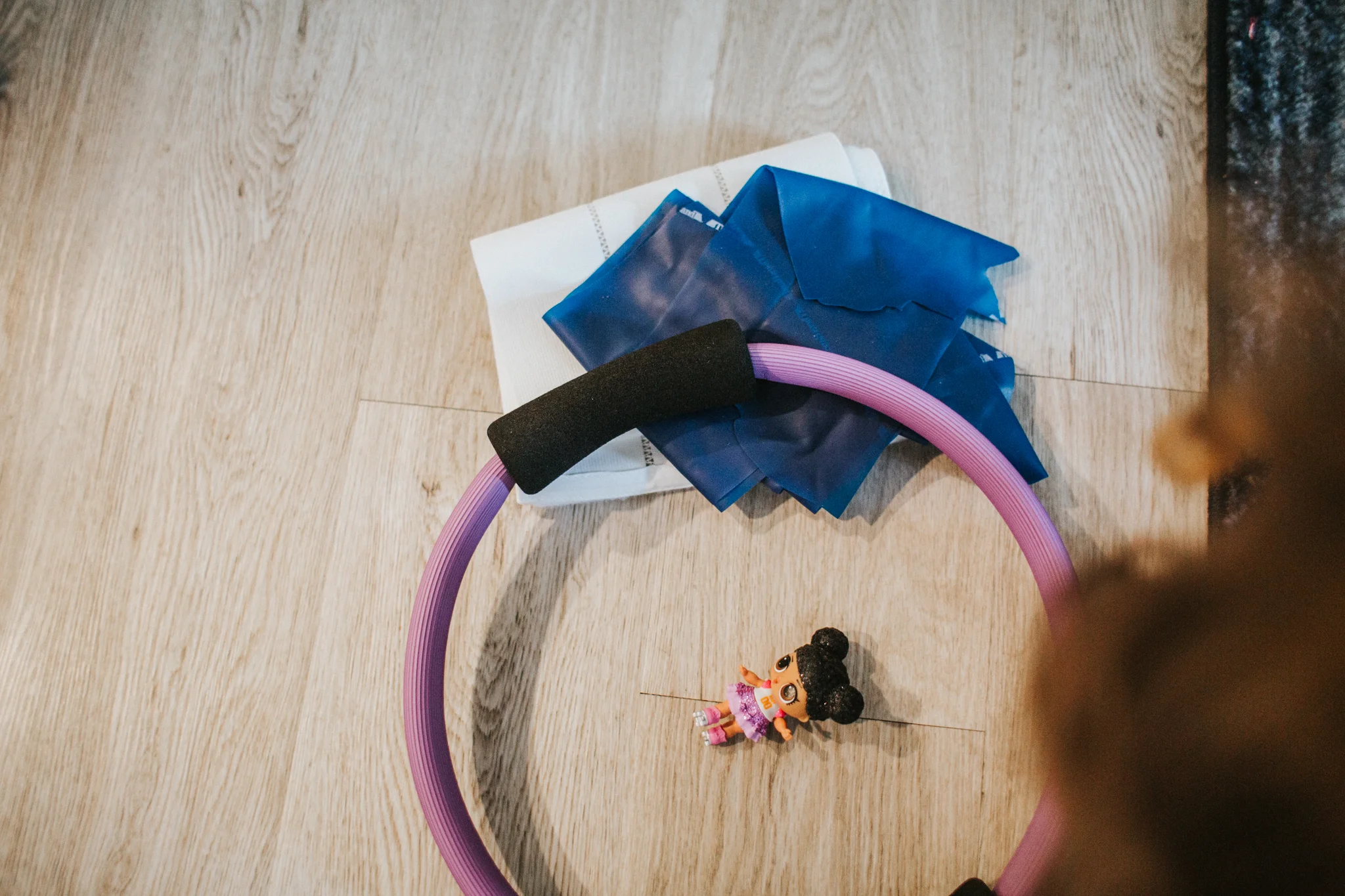 Dr. Kat Vigo brought a resistance band, post partum 3 Panel Abdominal Rehab Splint, and balance ring to our second home visit
