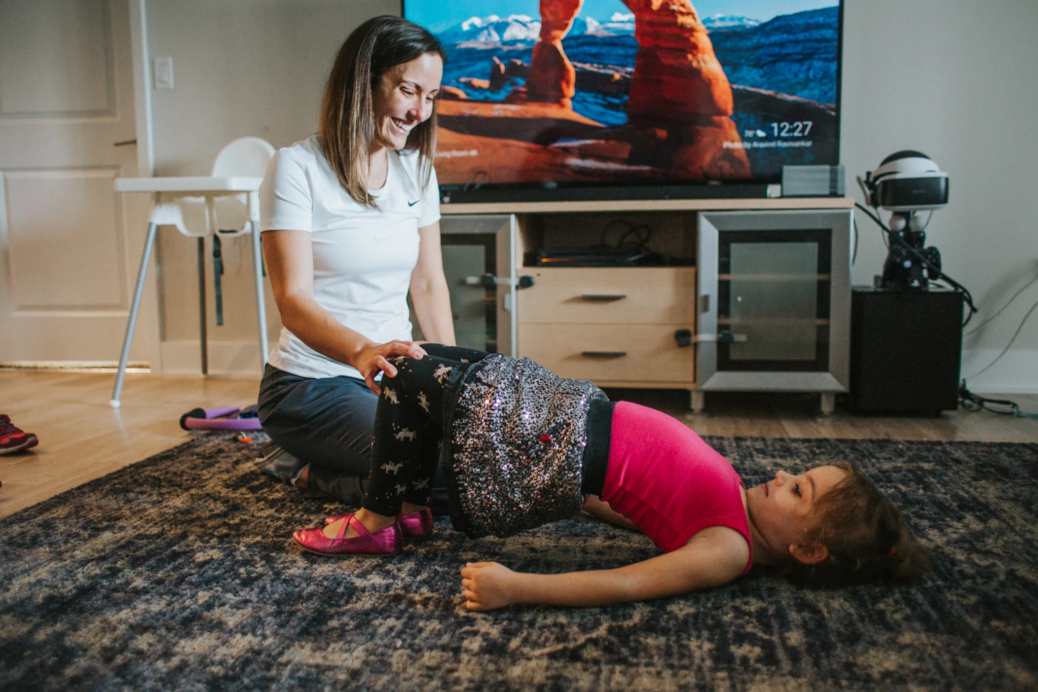 Dr. Kat Vigo showing my daughter Kate some core strengthening techniques