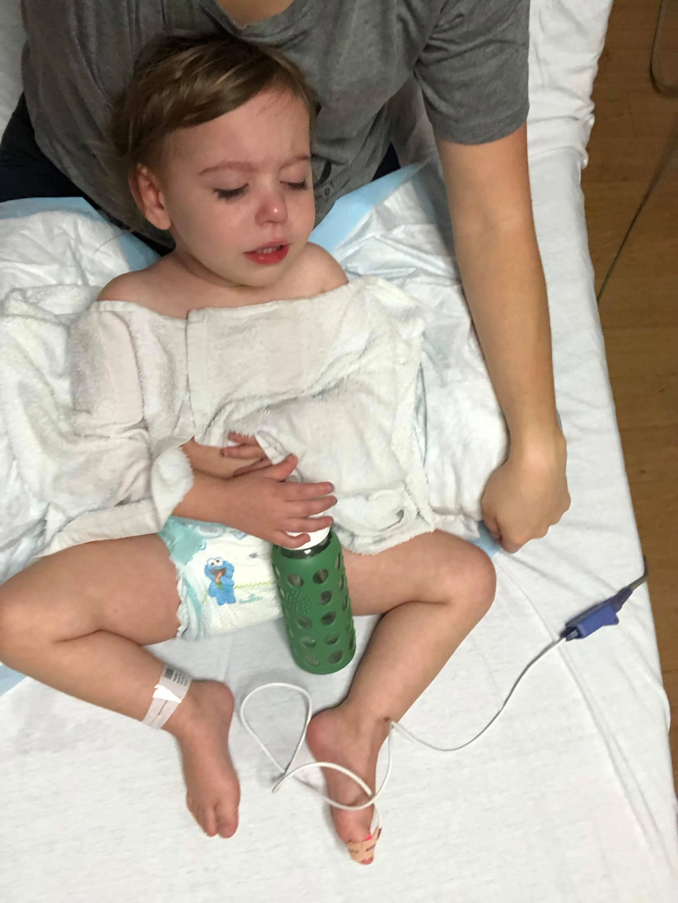 My baby girl fighting off 105 fever with me in the ER