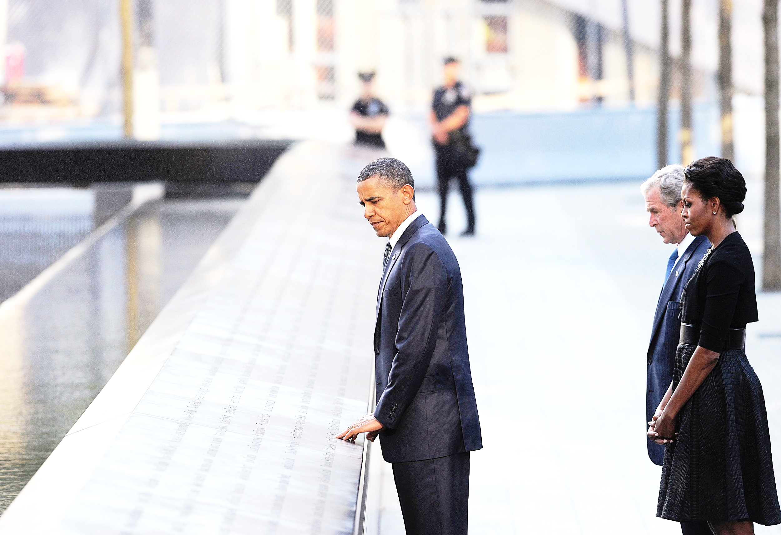 President Barack Obama, Michelle Obama, and President George W. Bush at the 9/11 National Memorial in Lower Manhattan