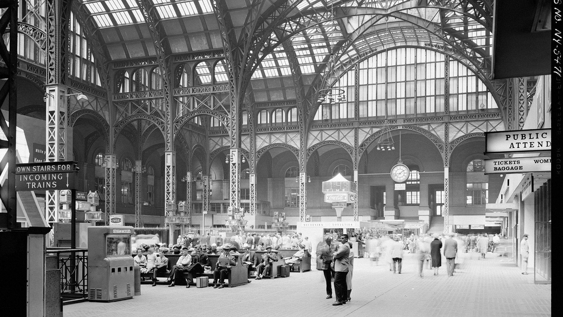 Pennsylvania Station, also known as New York Penn Station or Penn Station, is the main intercity railroad station in New York City. Serving more than 600,000 commuter rail and Amtrak passengers a day, it is the busiest passenger transportation facility in the Western Hemisphere. Penn Station is in the midtown area of Manhattan, close to Herald Square, the Empire State Building, Koreatown, and the Macy's department store. Entirely underground, it sits beneath Madison Square Garden, between Seventh Avenue and Eighth Avenue and between 31st and 34th Streets.