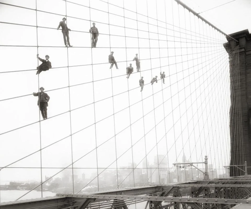 Workers at the Brooklyn Bridge ( 1914). The Brooklyn Bridge opened to the public on May 24, 1883, thereby connecting Manhattan with Brooklyn for the first time. Dubbed the “Eighth Wonder of the World,” early visitors gawked at its immense granite towers and thick steel cables, not to mention its birds-eye views. The bridge, which took 14 years and around $15 million to complete, remains among New York City’s top tourist attractions and a busy thoroughfare for commuters. Brooklyn did not become part of New York City until 1898, following a referendum that passed there by just 277 votes (out of more than 129,000 cast). | Image: New York City, Department of Records