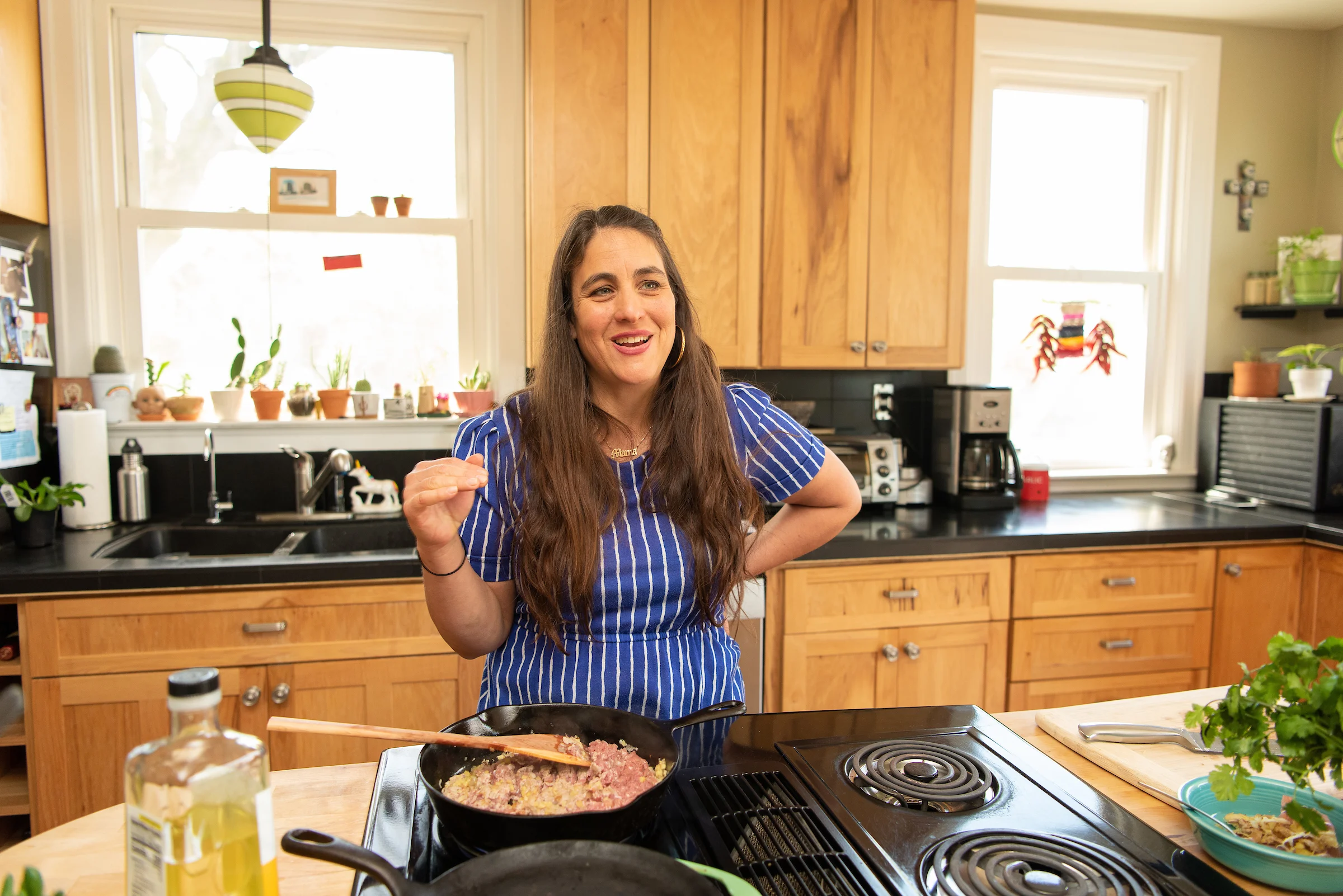 Nikki Guerro of Hot Mama Salsa and Chile Oils cooks an umi noodle dish