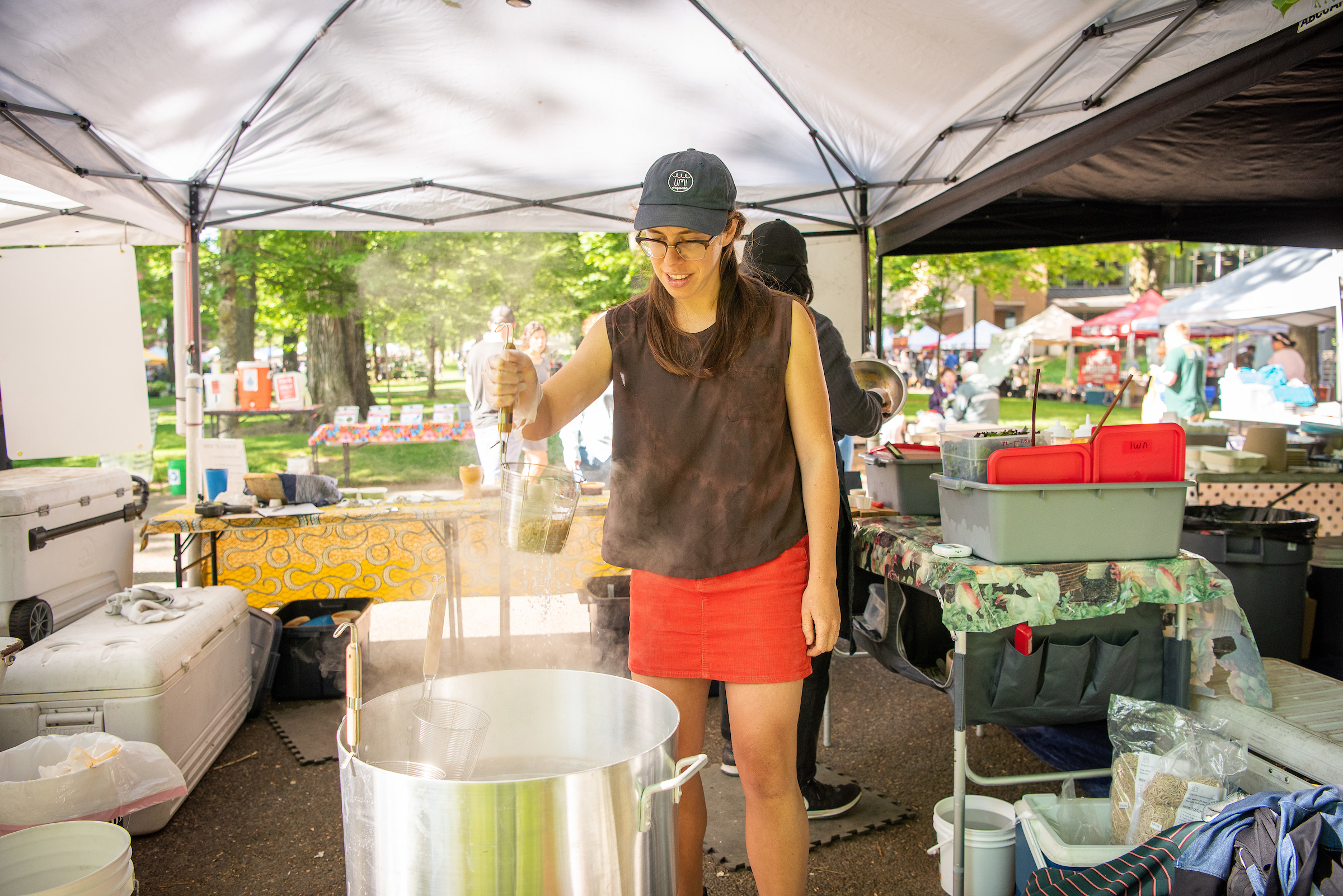  Lola Milholland serves her Umi Noodles at the PSU Farmers Market 