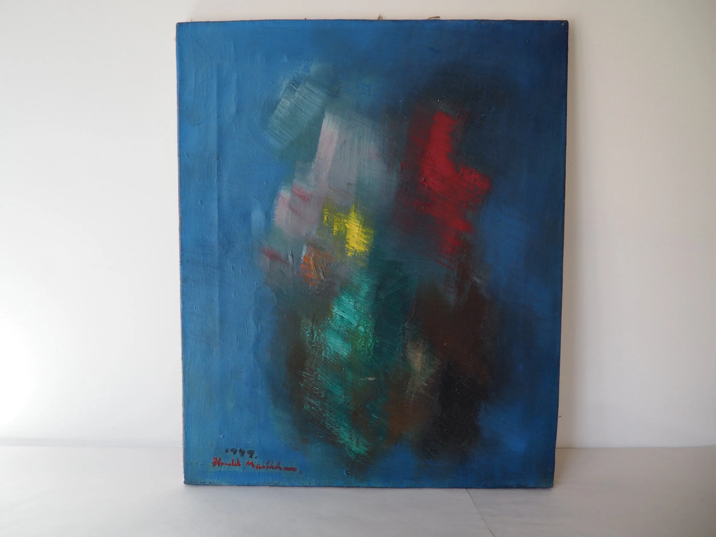 Abstrakt maleri blått med rødt og gult