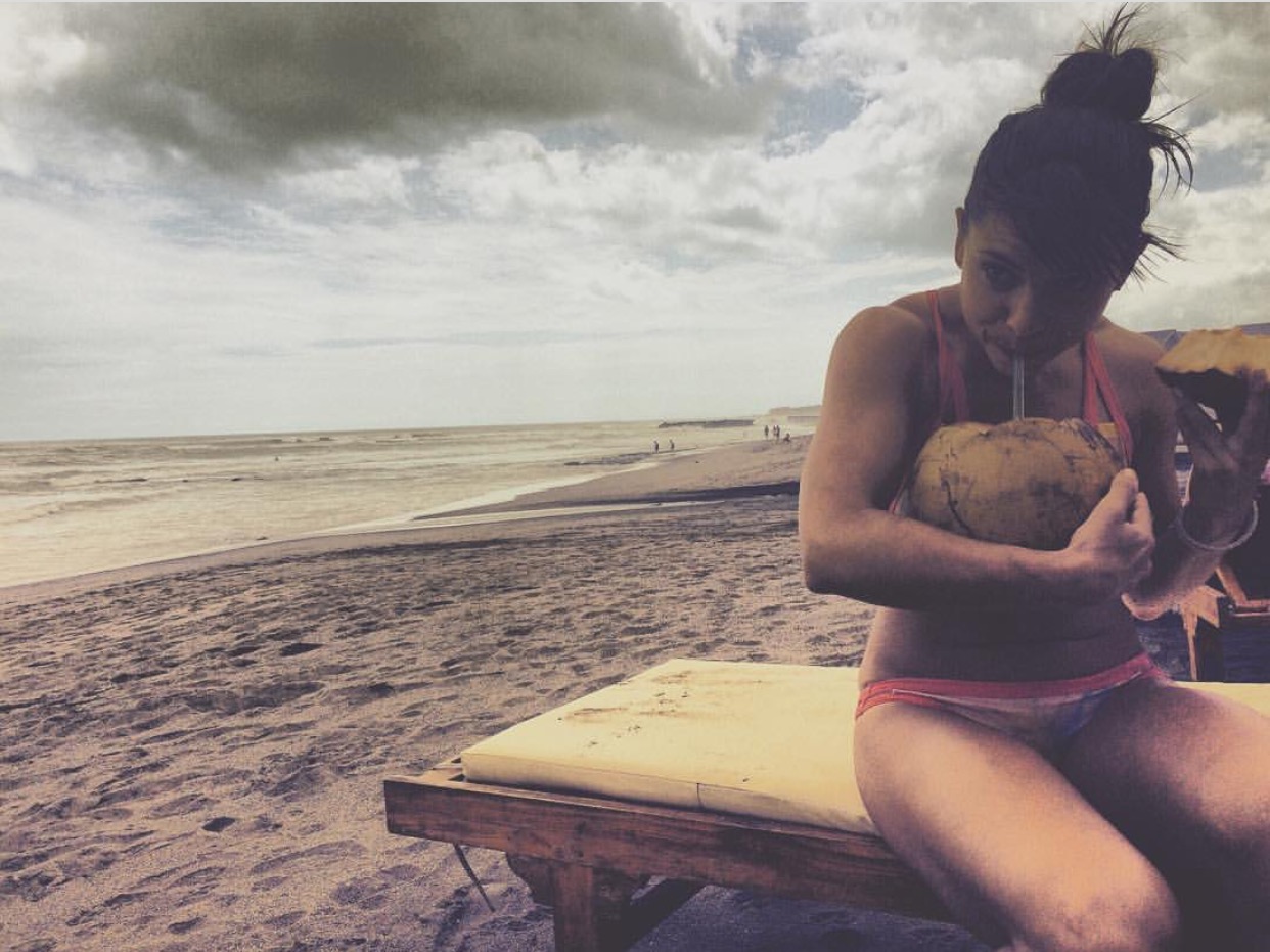 Essential job quitting environment: Beach, coconuts, and a new old friend. Photo by Lomicsa .