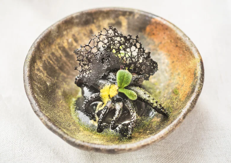A dish from Chef Miguel Aguilar plated on work from Alyce Barr. Photo courtesy of Amy Lee Studios.